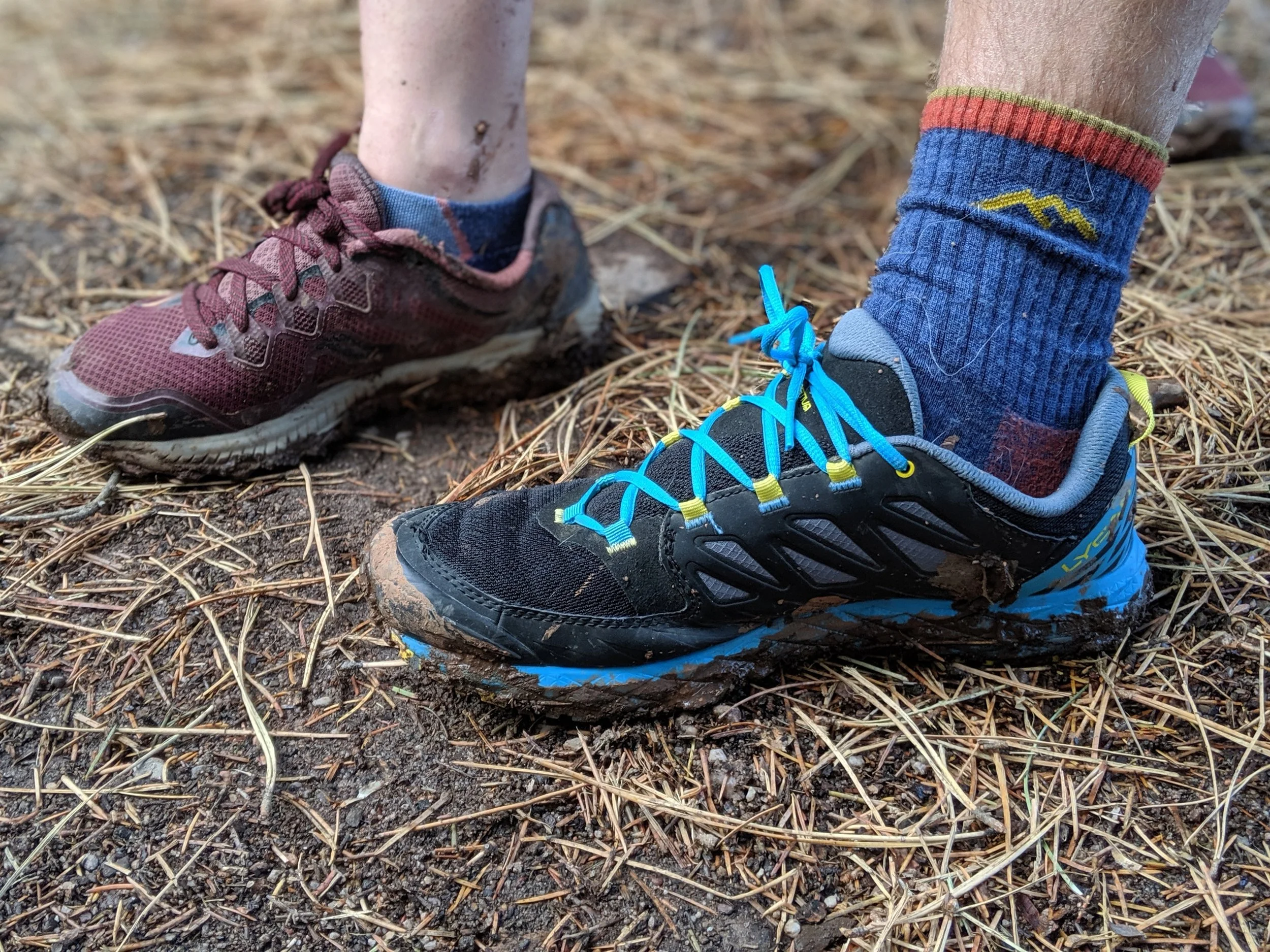 One hiker foot with a quarter crew Darn Tough sock and one with a micro crew Darn Tough sock