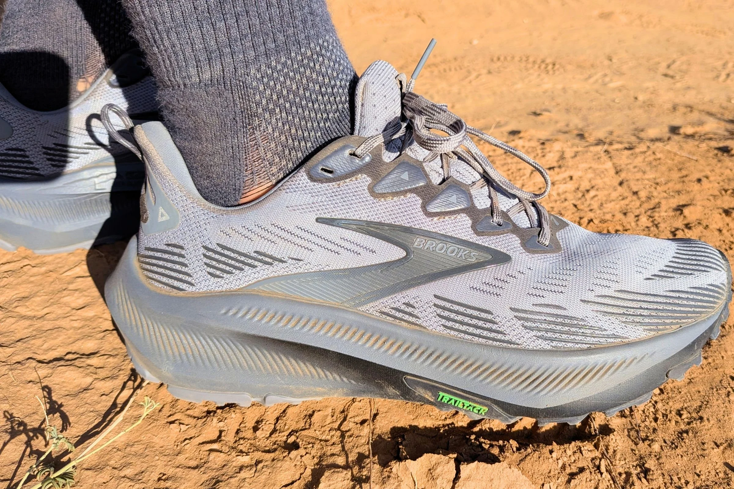 Close-up shot of gray Brooks Ghost trail running shoe.