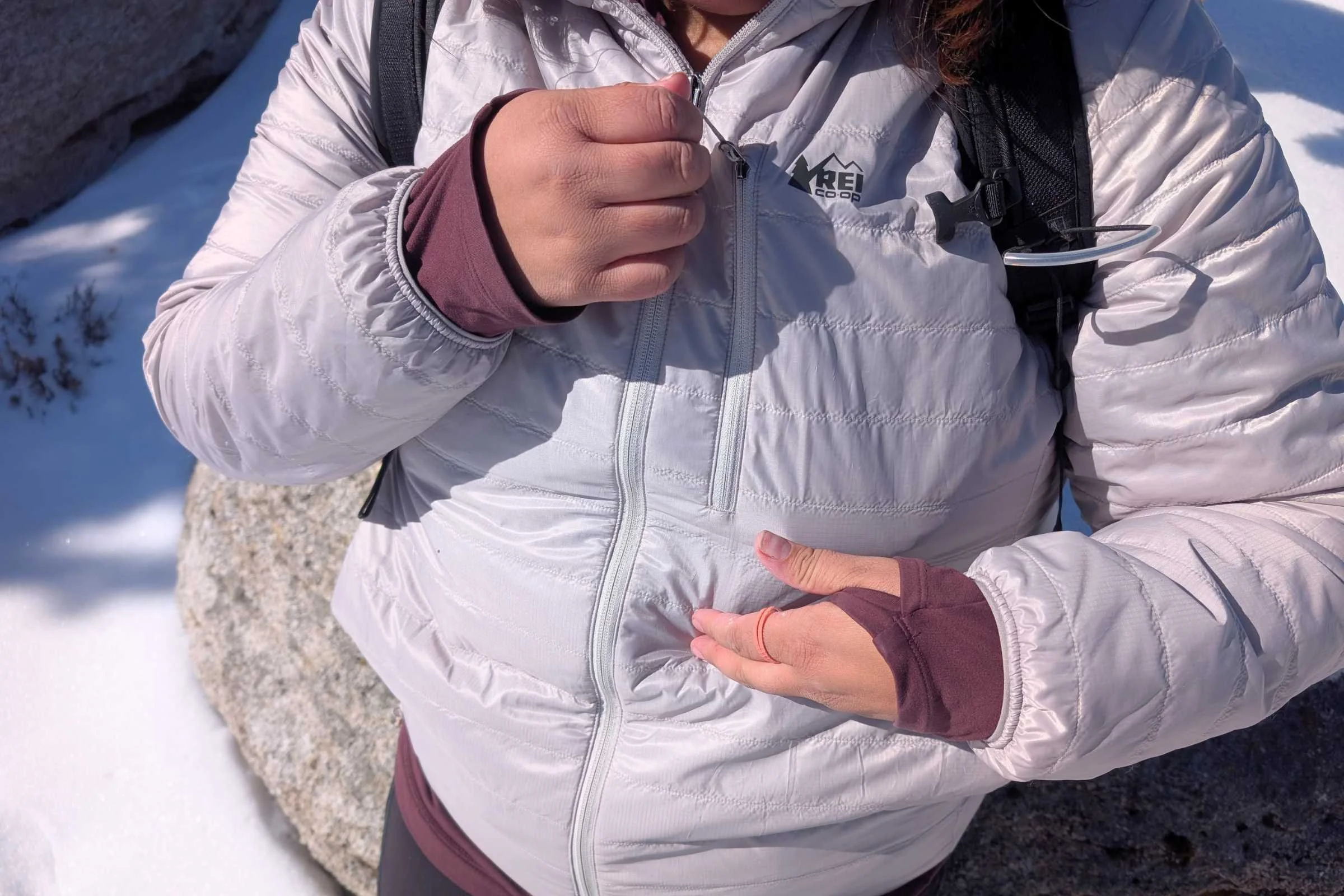 The arm cuffs of the Microtrek hoodie are designed to seal in warmth.