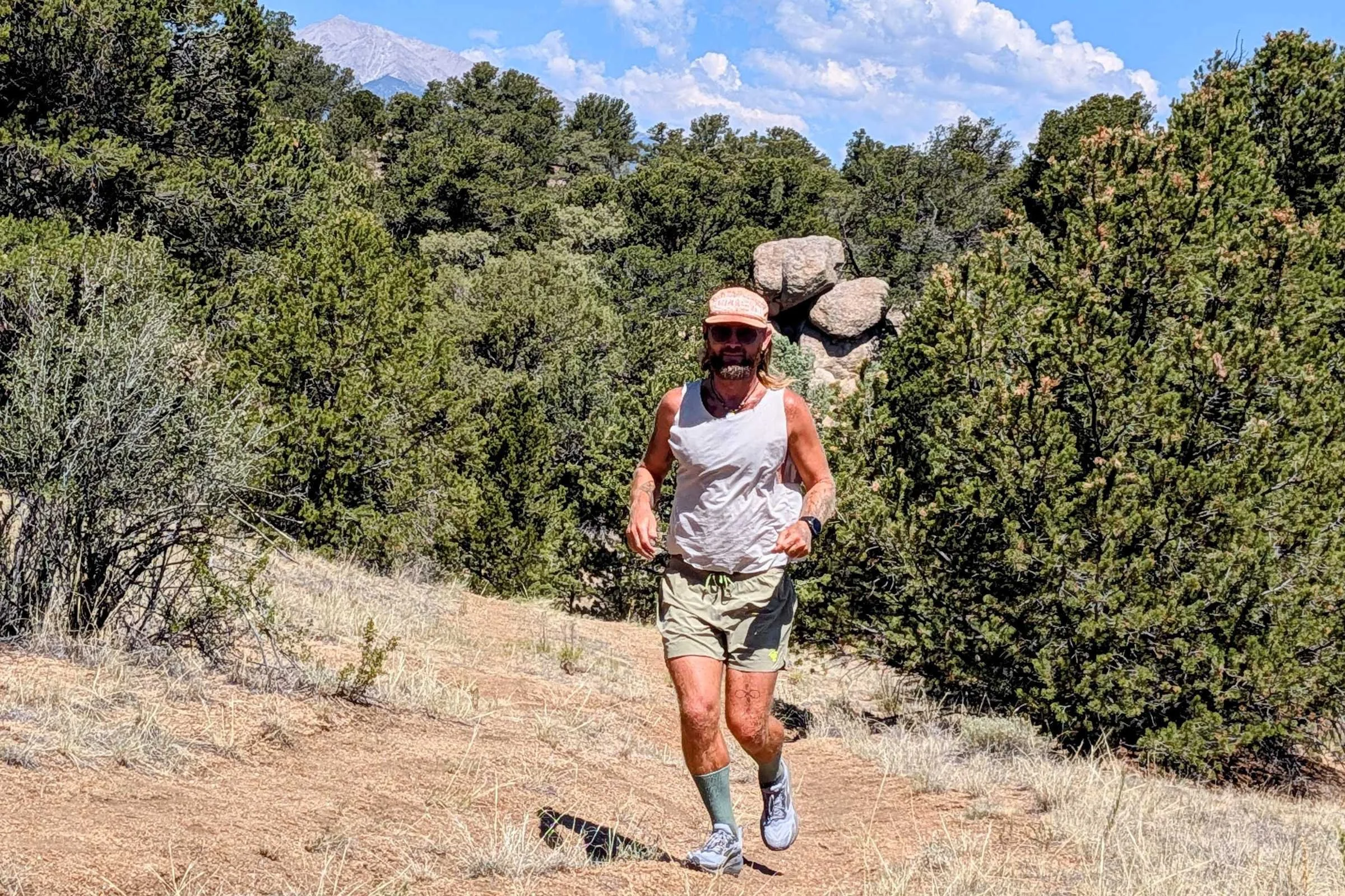 The author trail running in tan rabbit FKT shorts