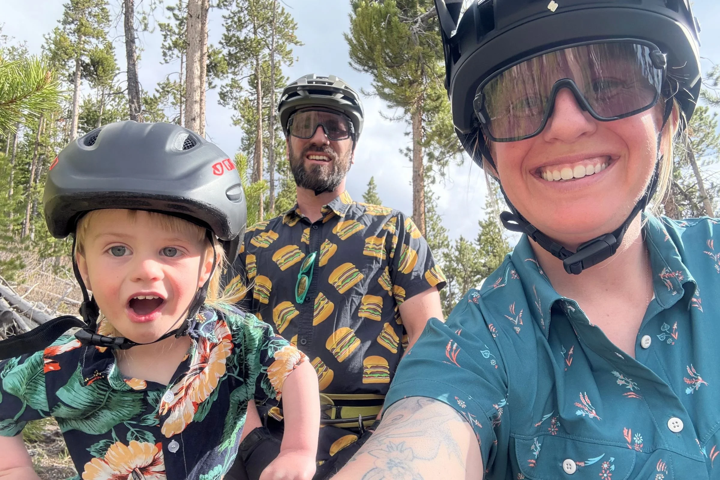 The author with her husband and son, who help with gear testing for Treeline Review, testing helmets together on a trail ride in Colorado. Photo by Stasia Stockwell.