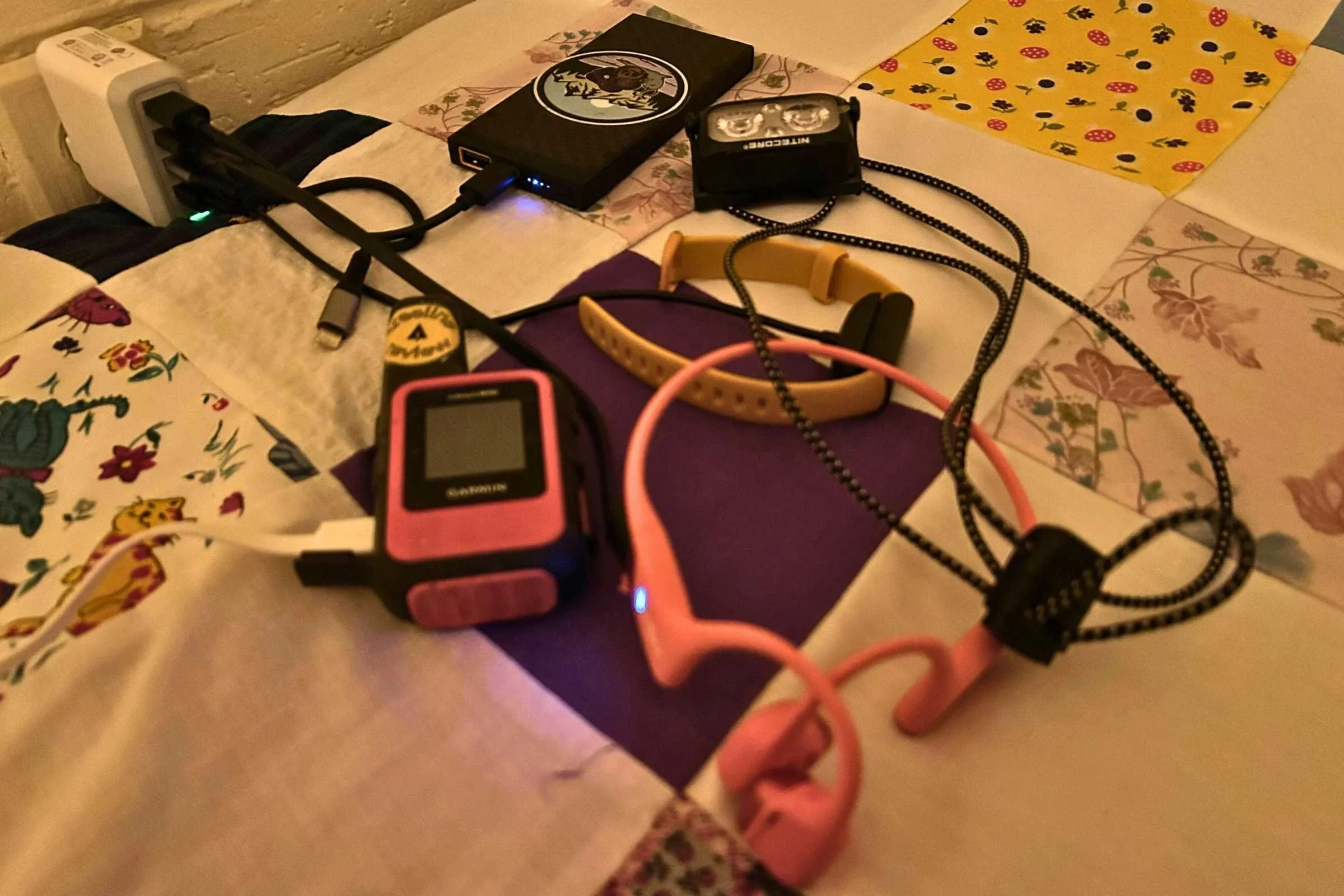 Liz charged her InReach, Power Bank, headlamp, headphones, and watch from the same 4-port USB wall charger.