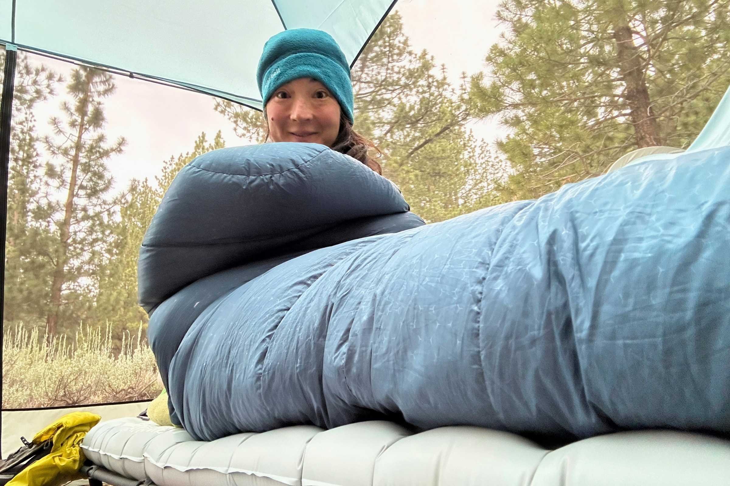 Person in a sleeping bag on Sea to Summit Ether Light XR Insulated Air Sleeping Pad