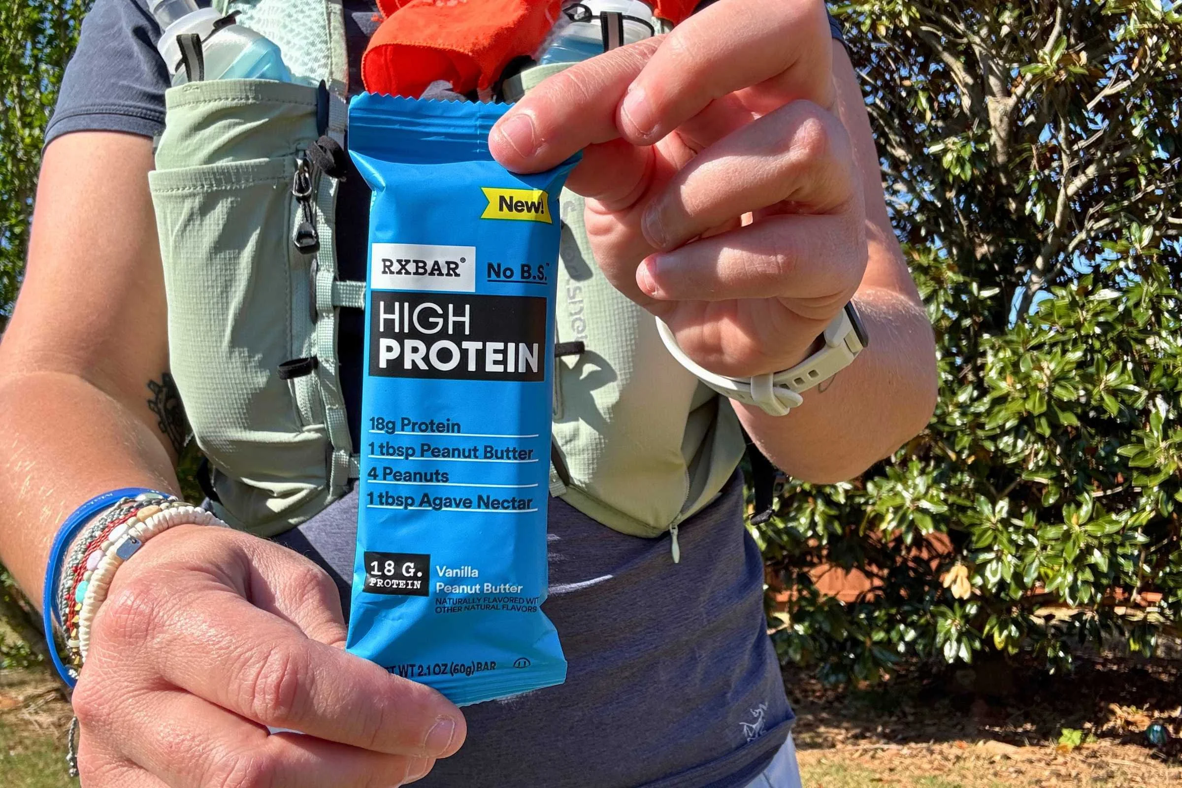person holding up an RXBAR