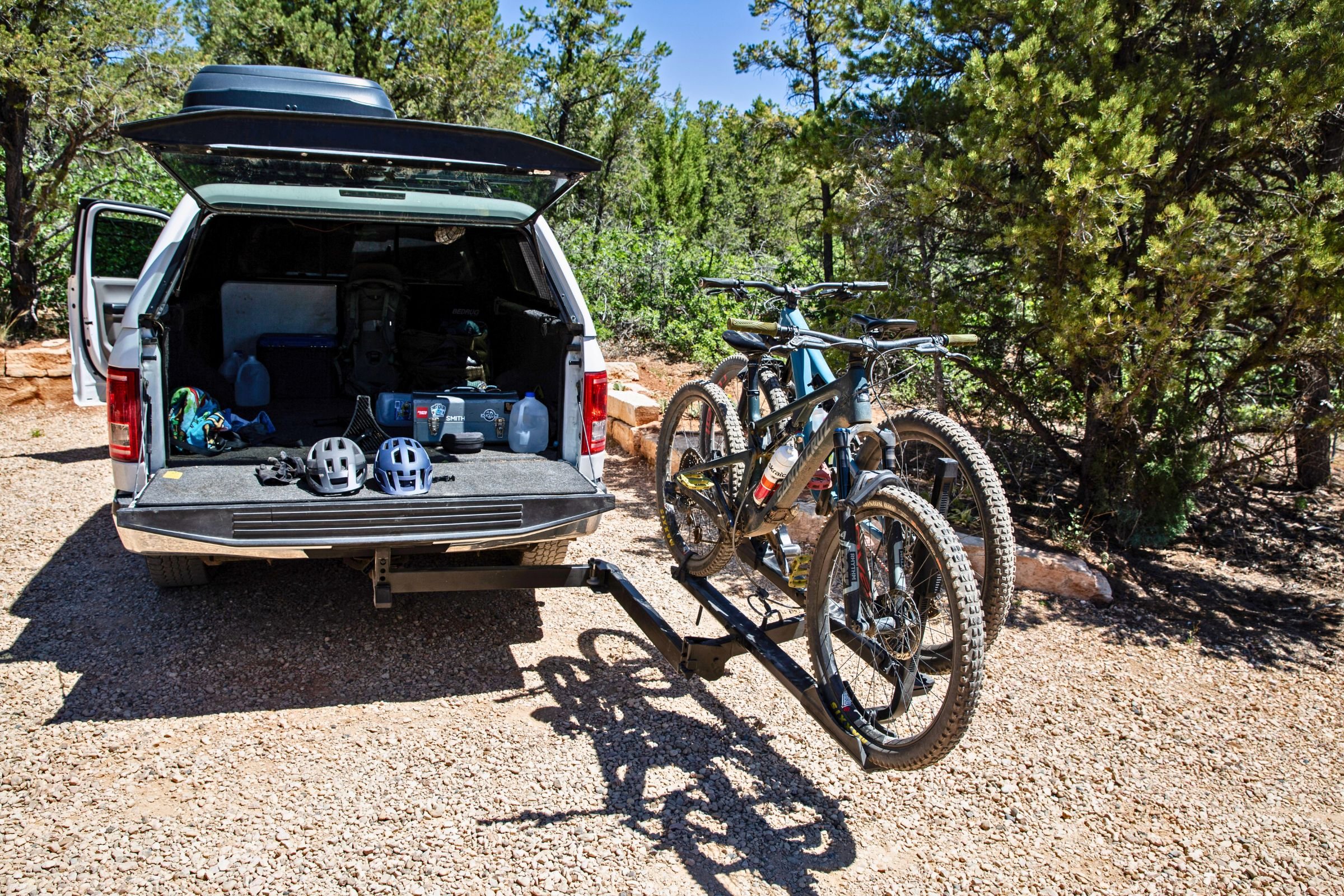 Yakima StepUp Swing 2” Hitch Bike Rack mounted on a truck with the swing-out arm deployed.