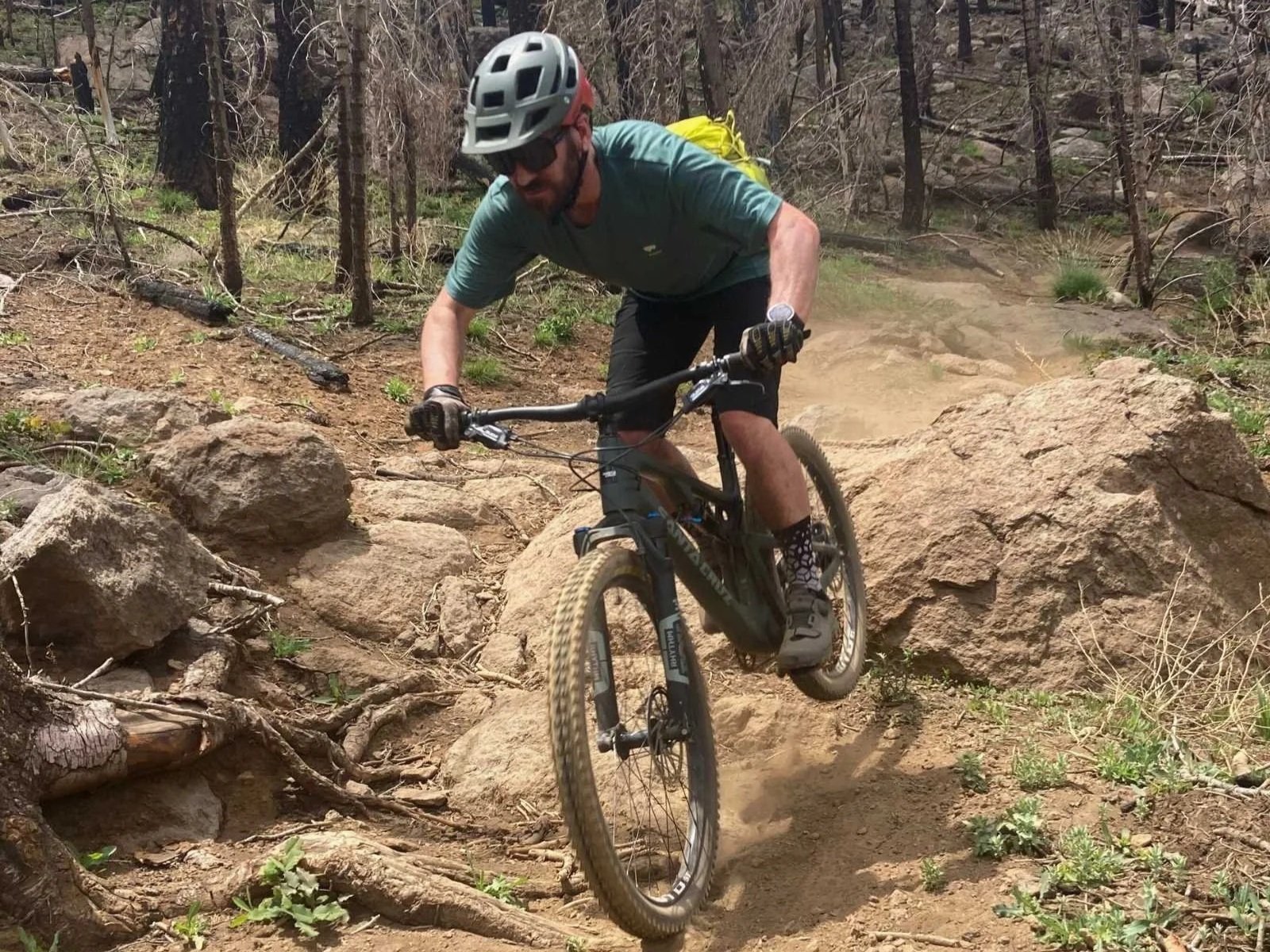 Our primary men’s tester riding on a section of the Arizona Trail near Flagstaff on a hot day. Photo by Stasia Stockwell.