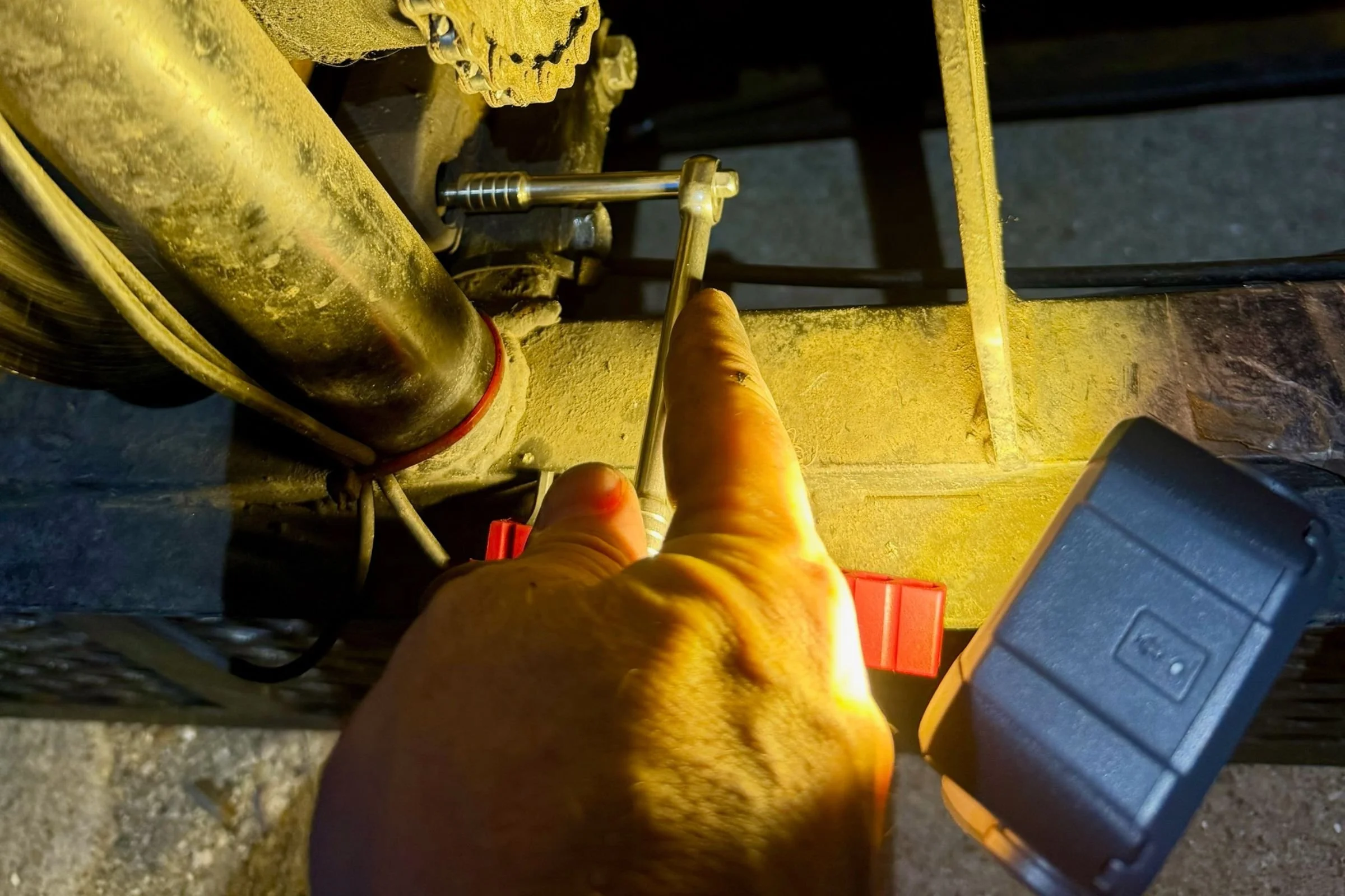 Using the ratchet on the Victorinox Swiss Tool X Plus Ratchet to adjust a hydraulic bike disc brake. Courtesy Chris Meehan
