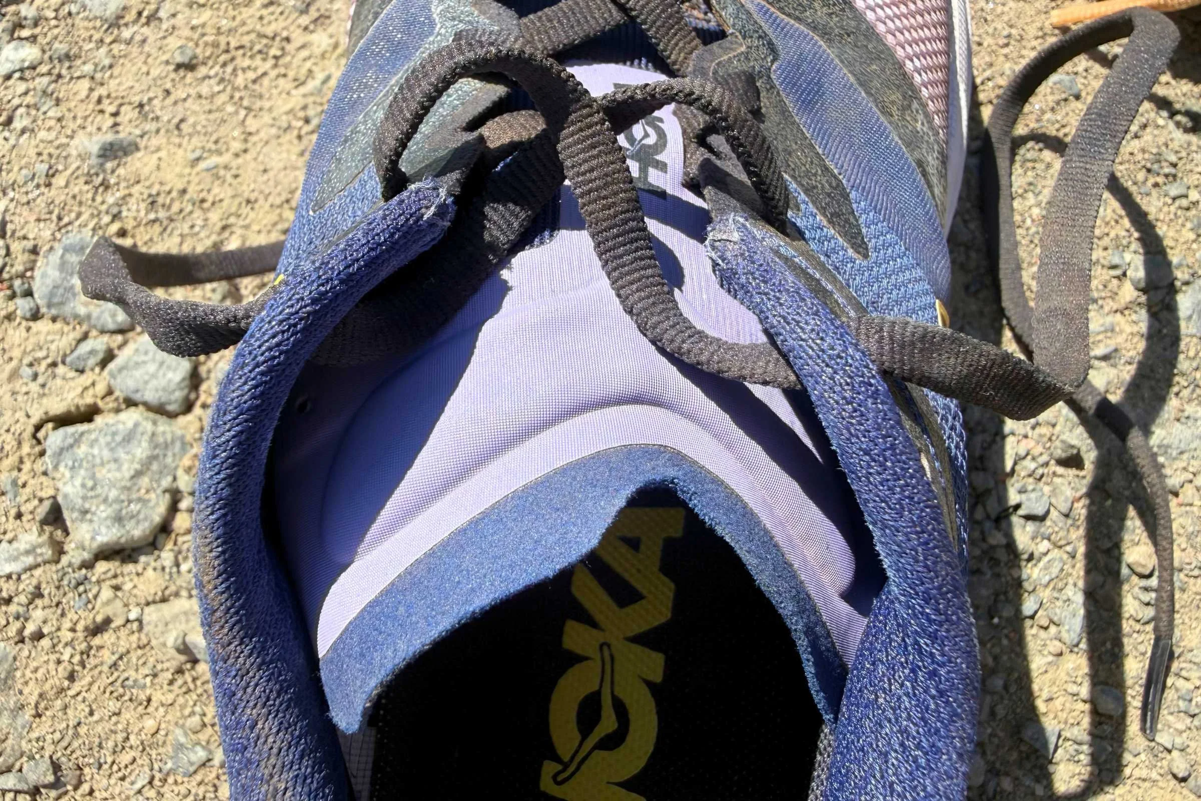 The tongue on the HOKA Speedgoat 7 has more cushion to alleviate pressure on the top of your foot when you tie your shoes.