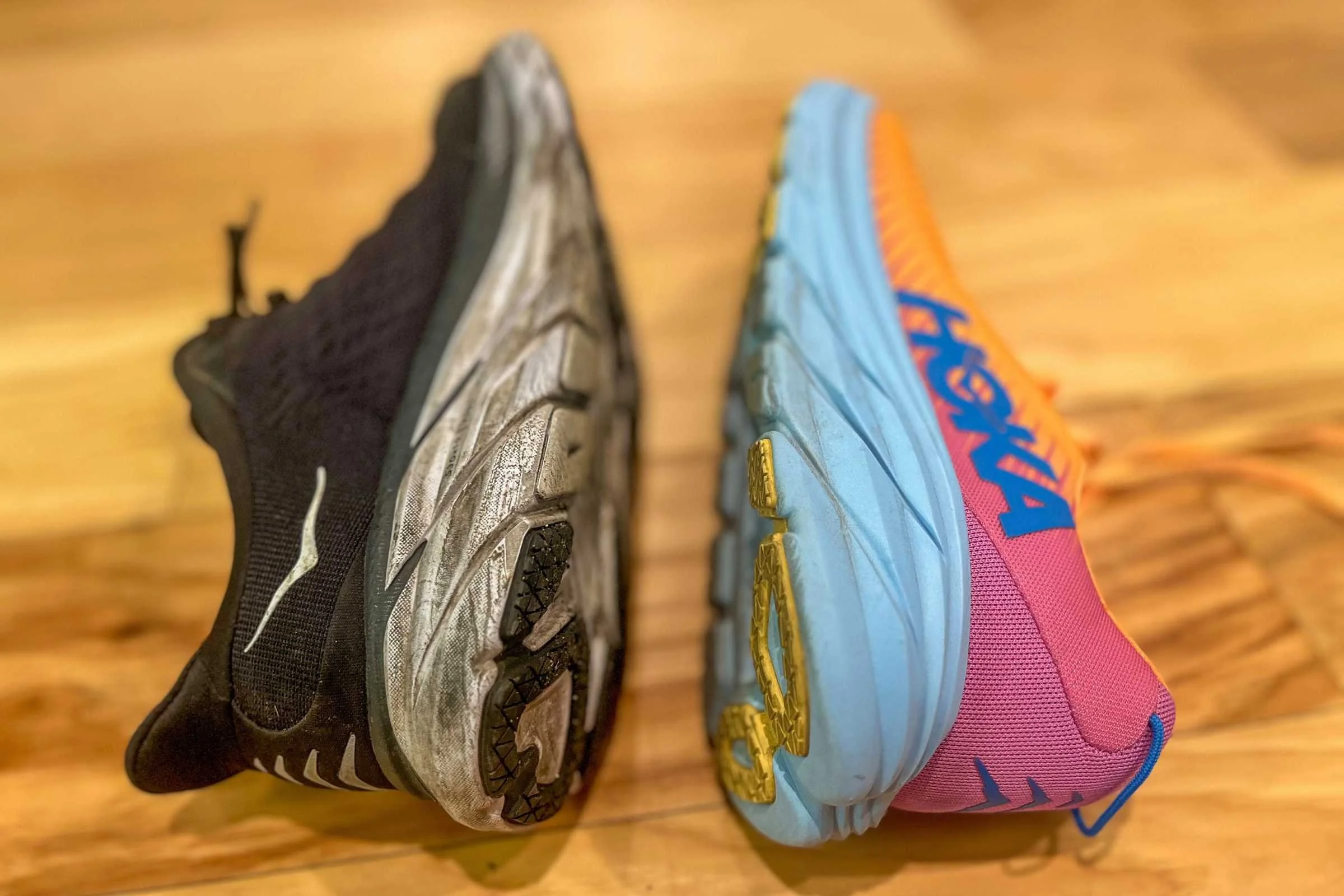 Sometimes you can tell you need new shoes by how worn down the outsole is. Here, the outsole of a well-worn Hoka Clifton 8 (left) is smoother and less grippy than the outsole of the gently-used Hoka Rincon 3 (right)