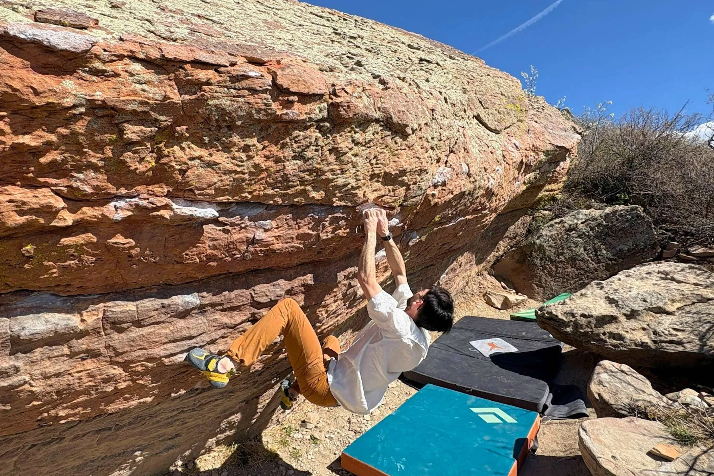 Climber bouldering outdoors