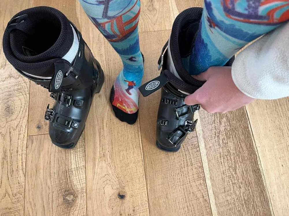 thin technical ski socks vs cotton socks comparison in ski boot