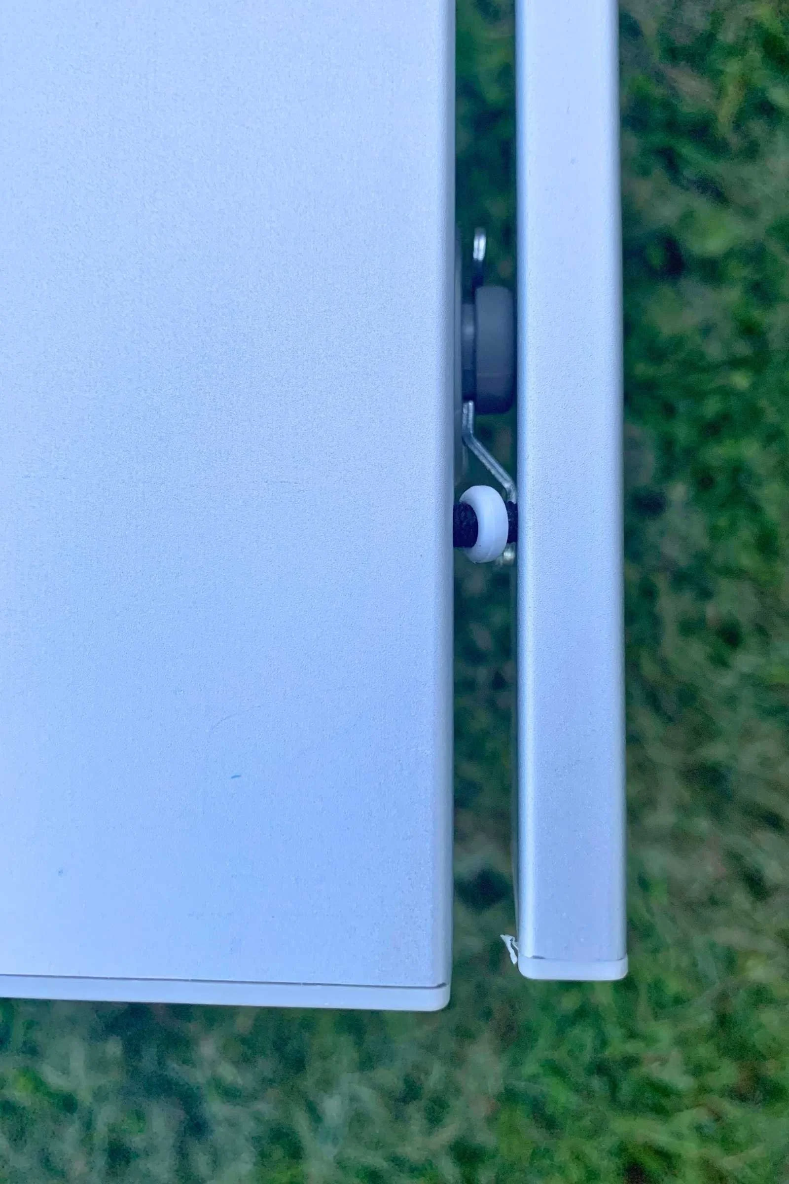 The Alps Mountaineering Dining table uses sturdy aluminum to build a durable tool-top table suitable for holding hot pans and a camp stove.