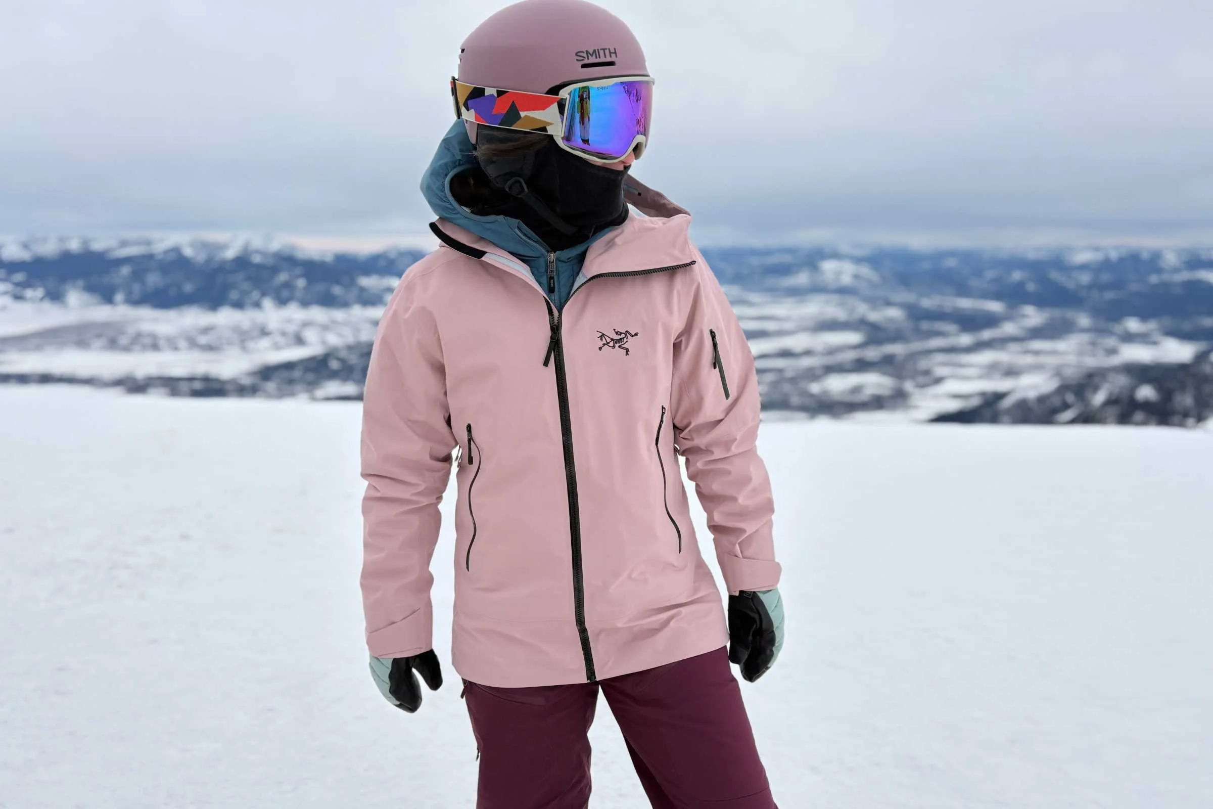 The author wearing a pink Arc’teryx Sentinel jacket