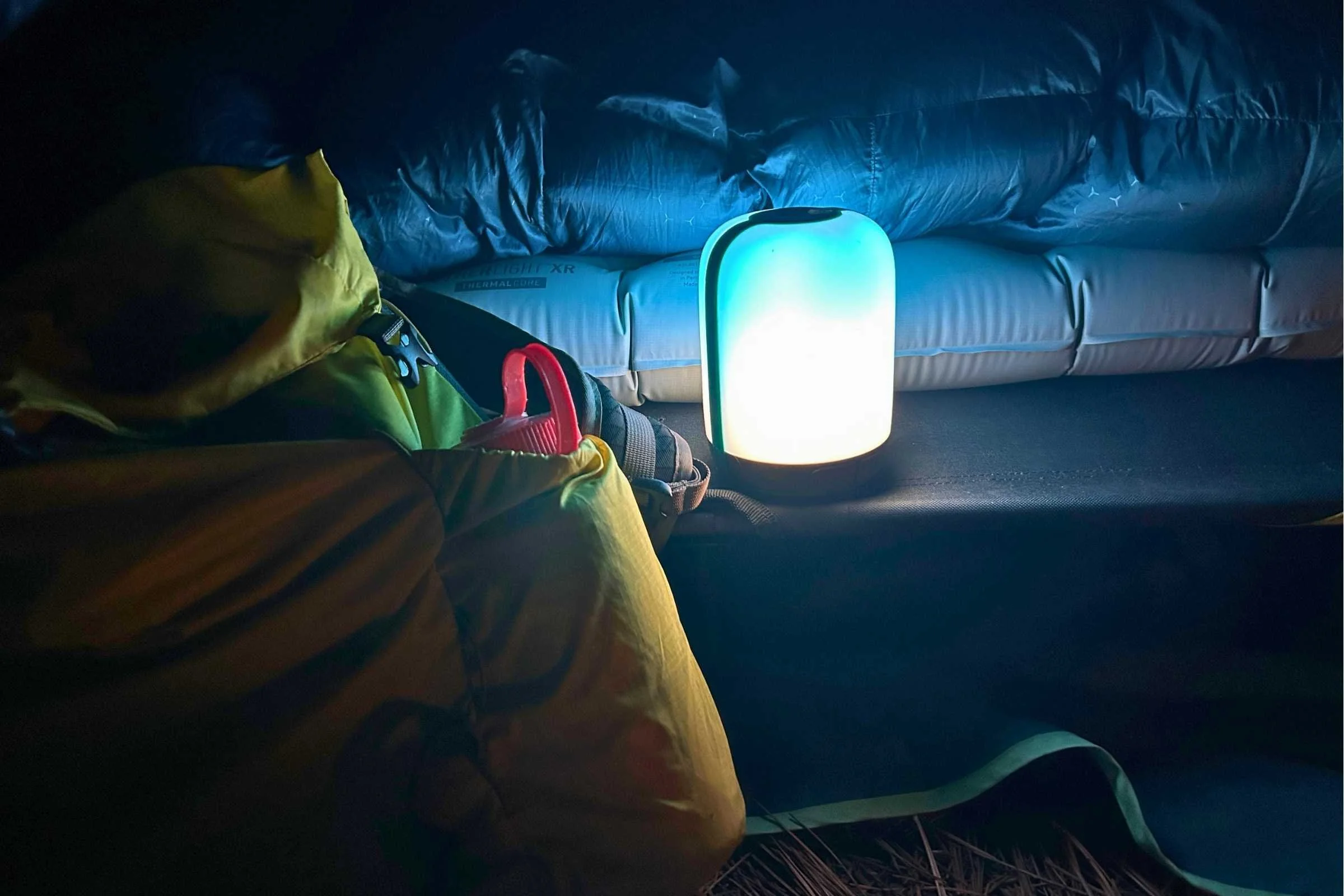 Nearly 4" of thickness make the Sea to Summit sleeping pad incredibly comfortable for sleep. BioLite Alpenglow lantern used to give size perspective.