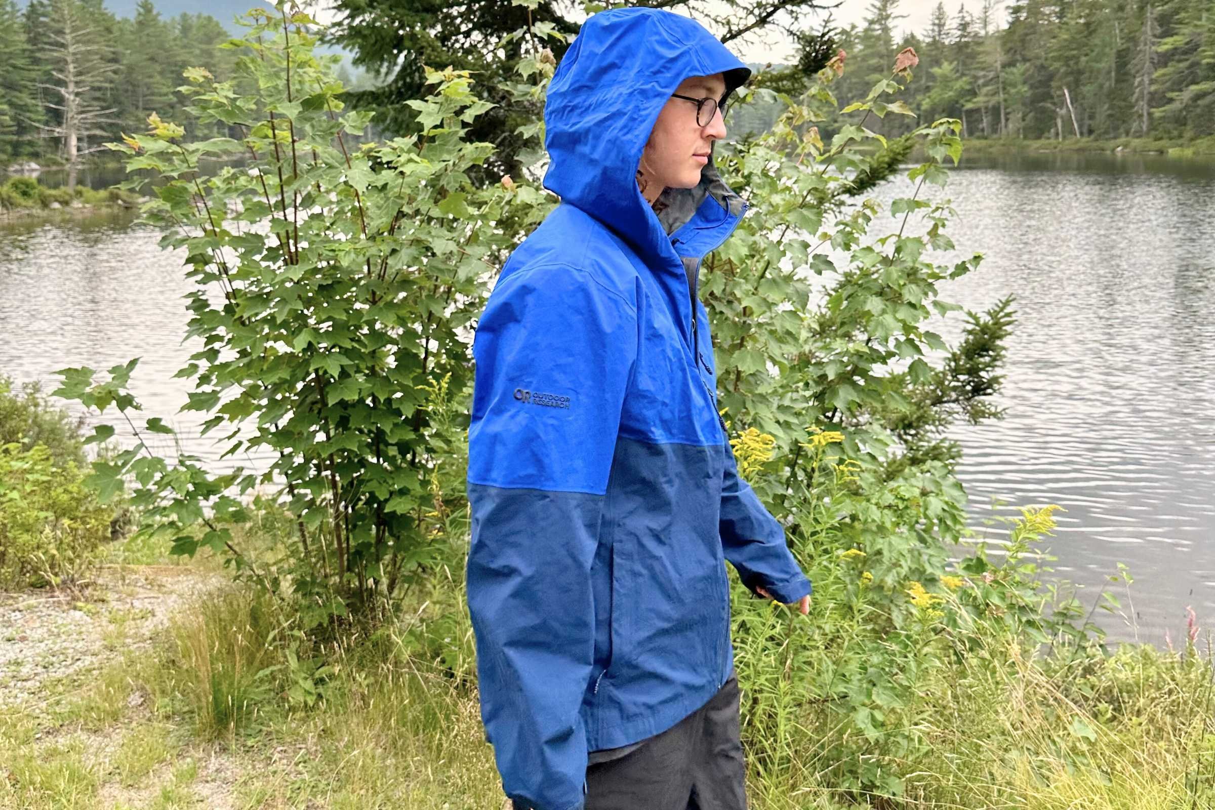 Side view of Outdoor Research Foray rain jacket on Elliot