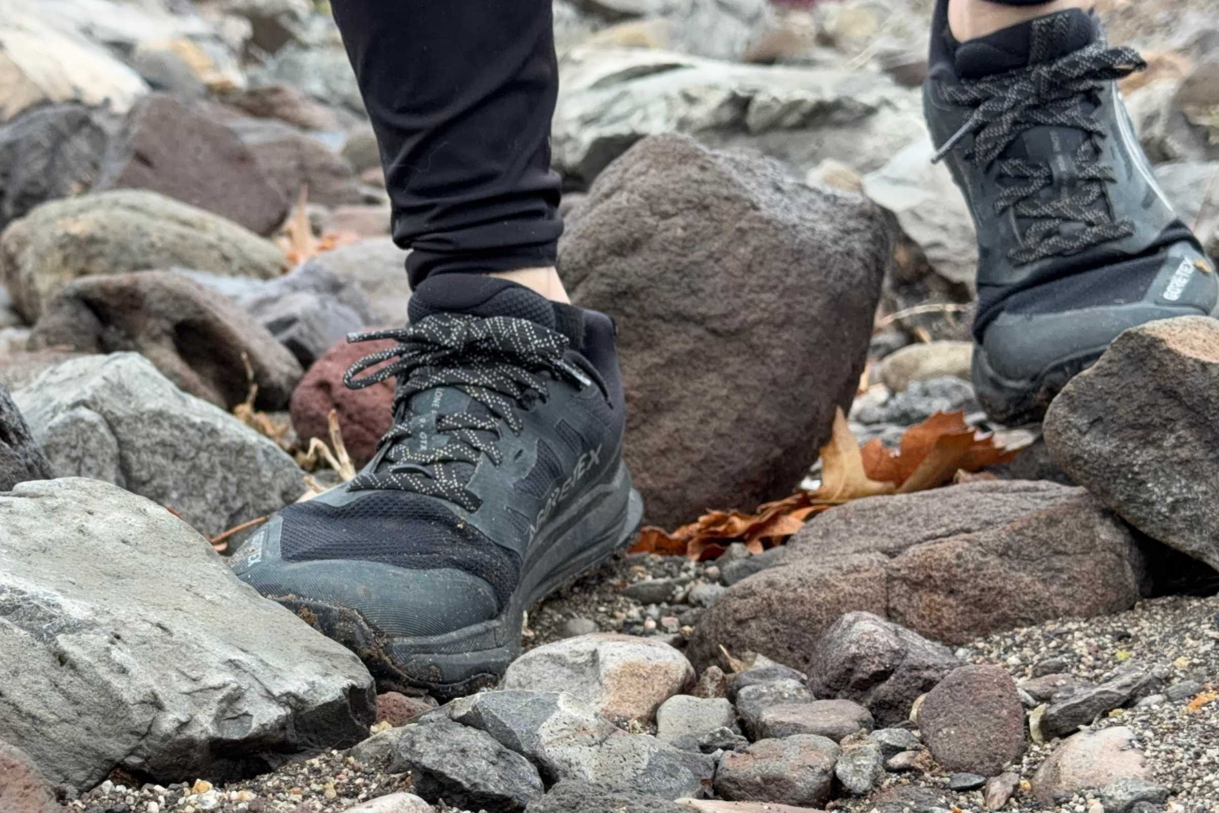 Altra Long Peak 9+ GTX shoes on a rocky riverbed