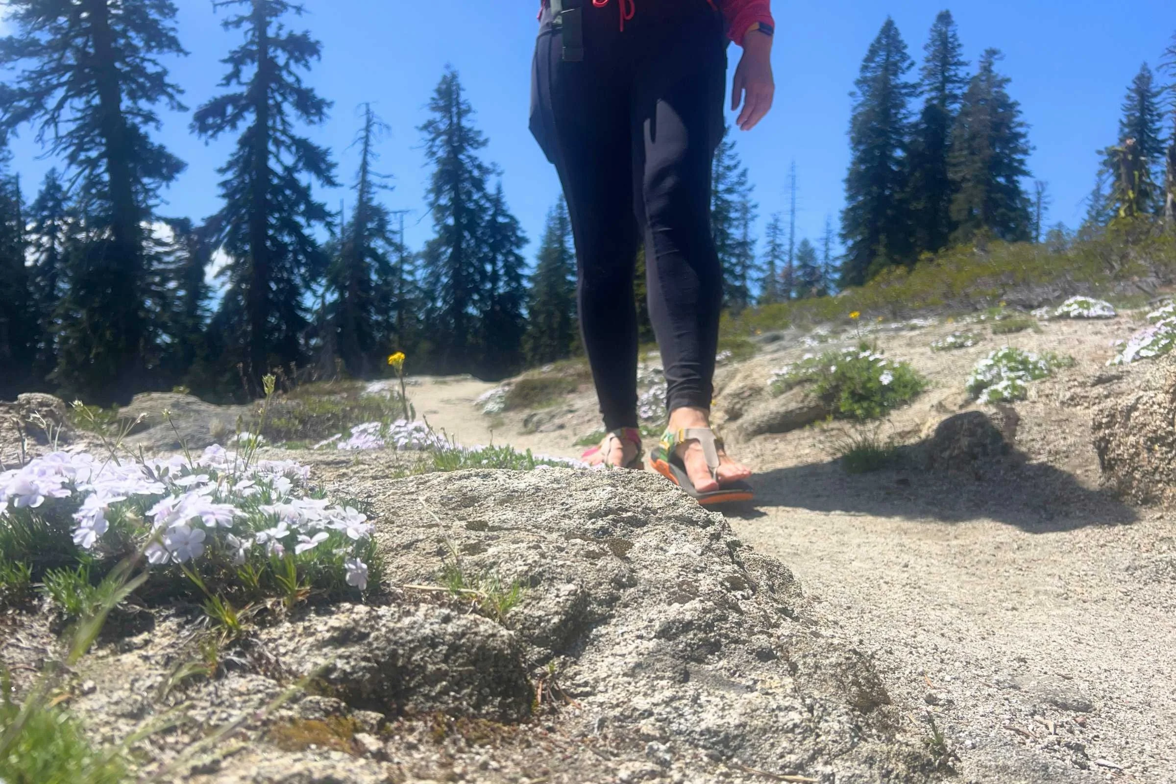 Hiking in the Lems Switchback Sandal Knit on a high desert trail