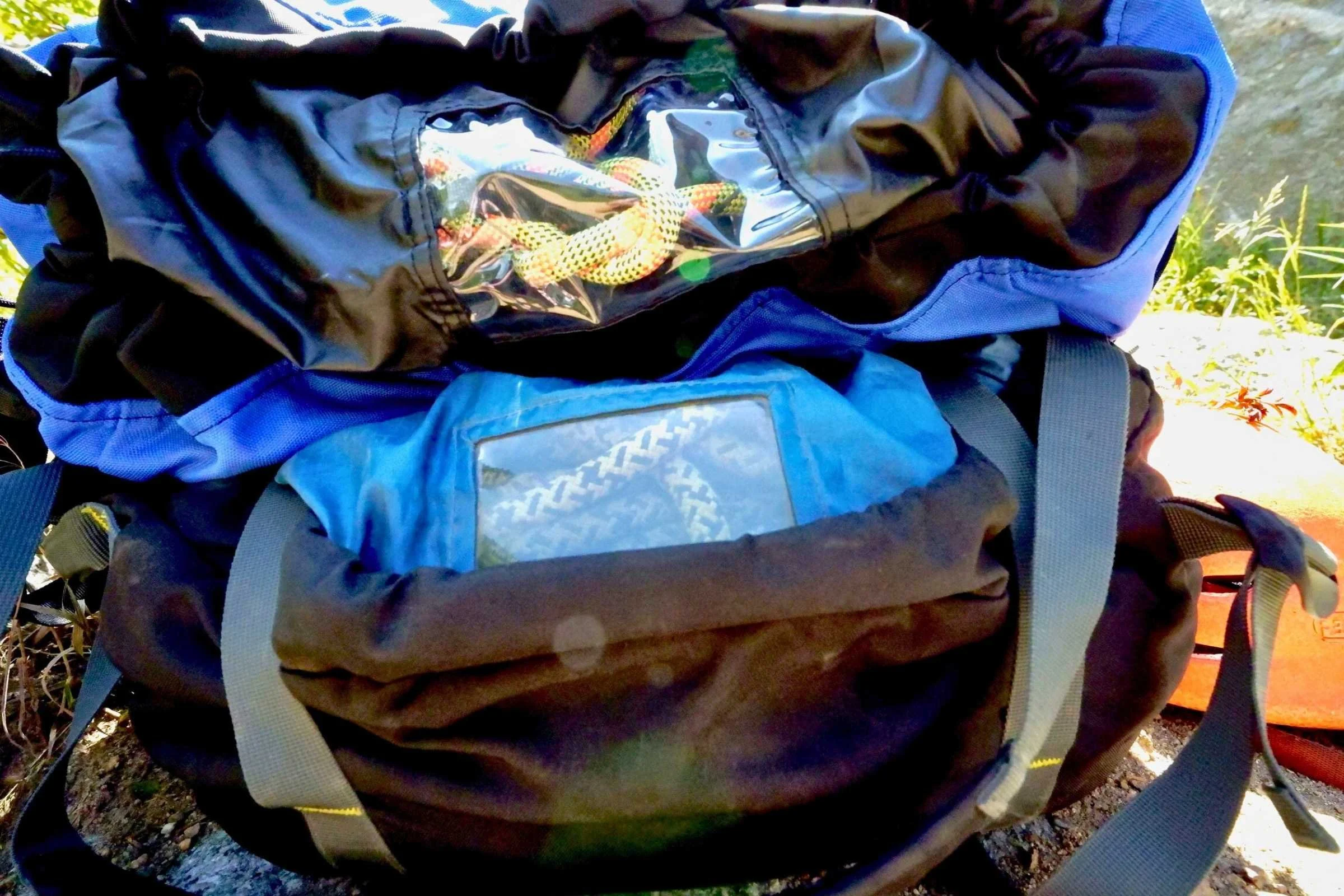 The rope viewing windows on a new Metolius Ropemaster HC compared to a roughly 10 year-old Trango Antidote bag.