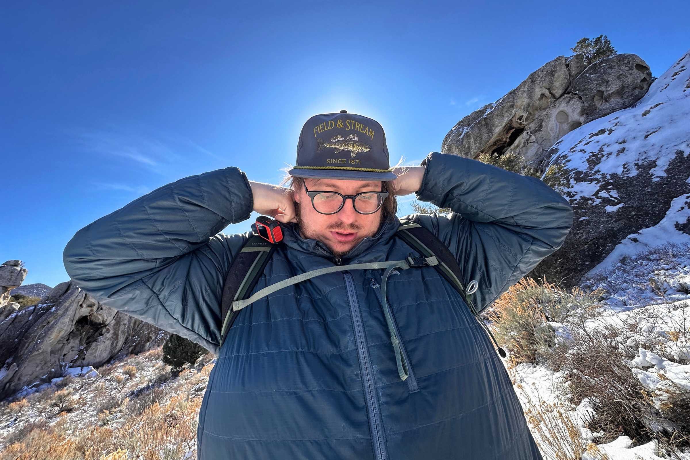 Adjusting the fit of the REI Microtrek Hoodie.