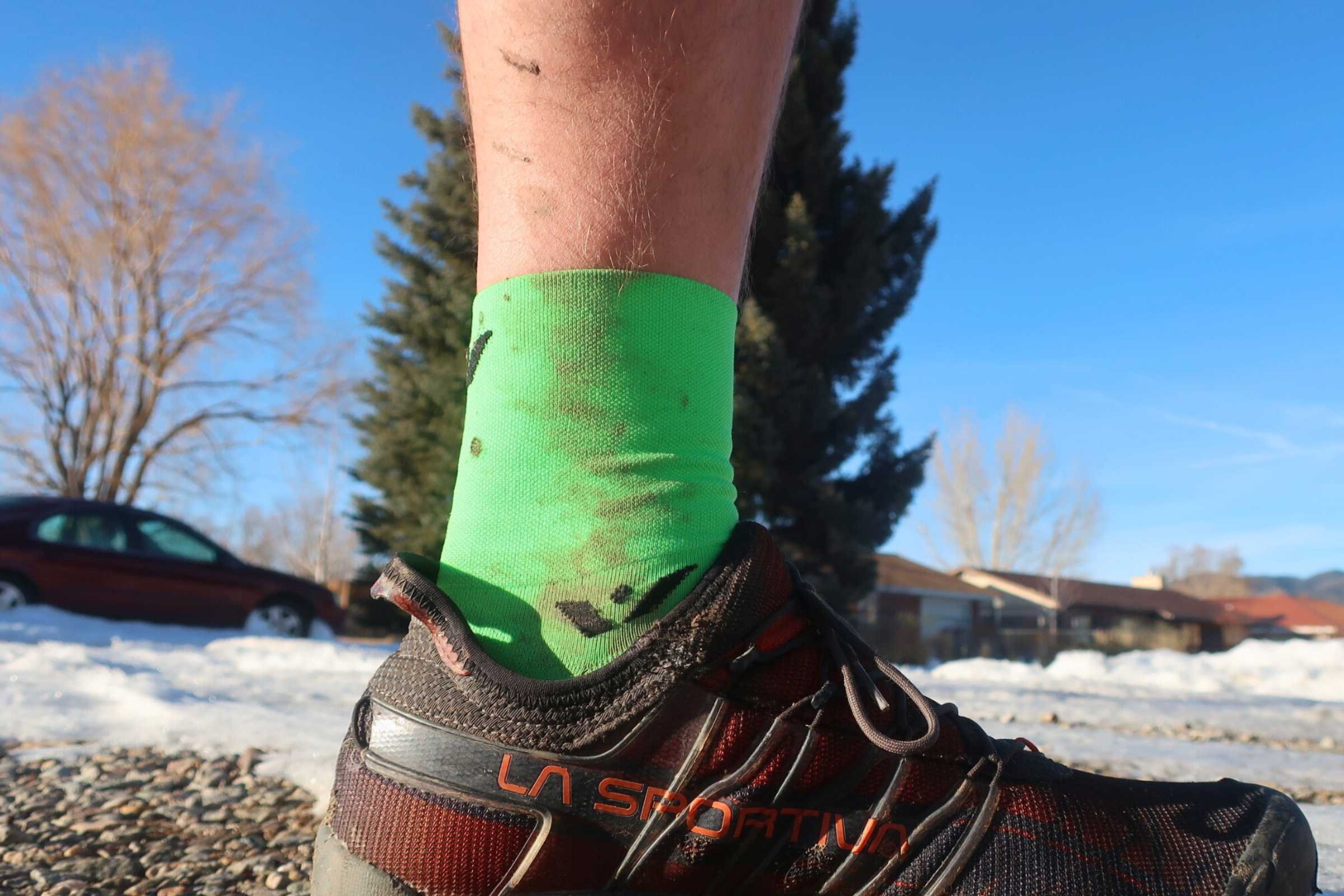 Returning home from a late winter, mild weather day of slush and mud, the Swiftwick Aspire Four—an in-between a micro crew and a full crew—provided some welcome lower leg coverage. Wearing a La Sportiva Mutant shoe.  Photo by Trey French