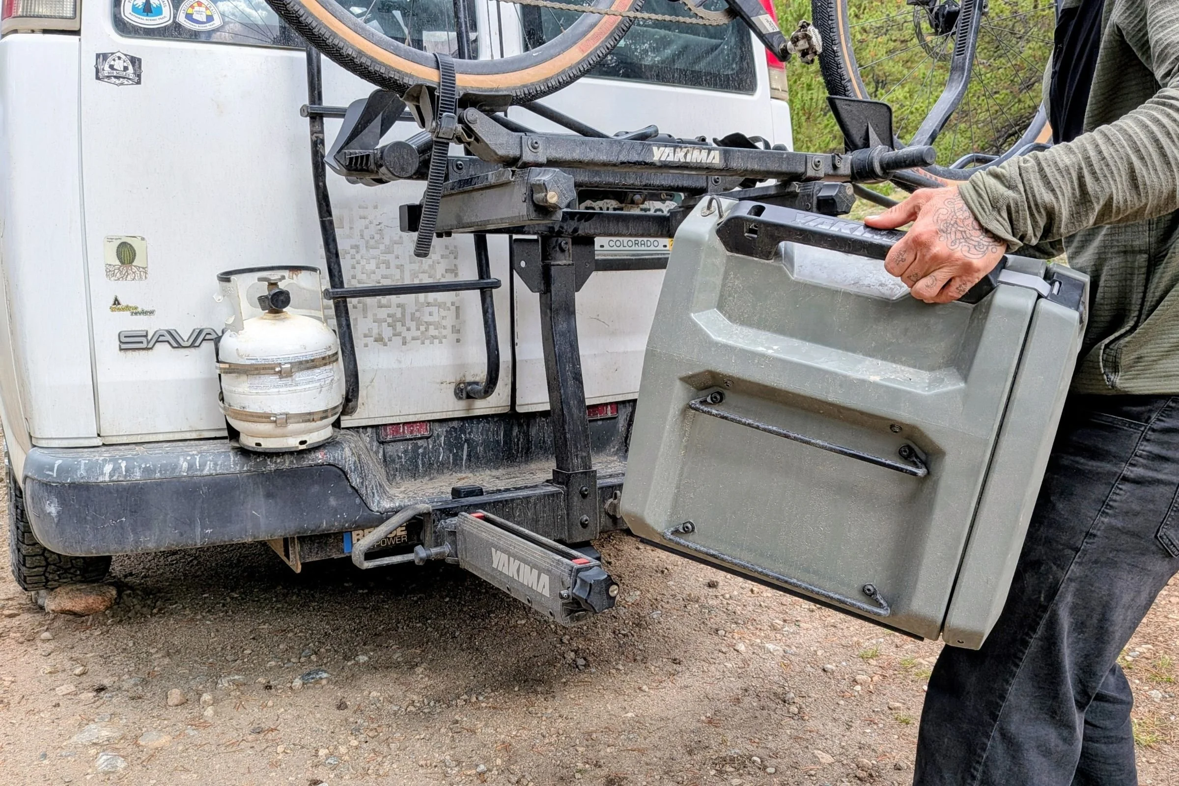 Close-up detail of a Yakima EXO Swing mounted on a vehicle.