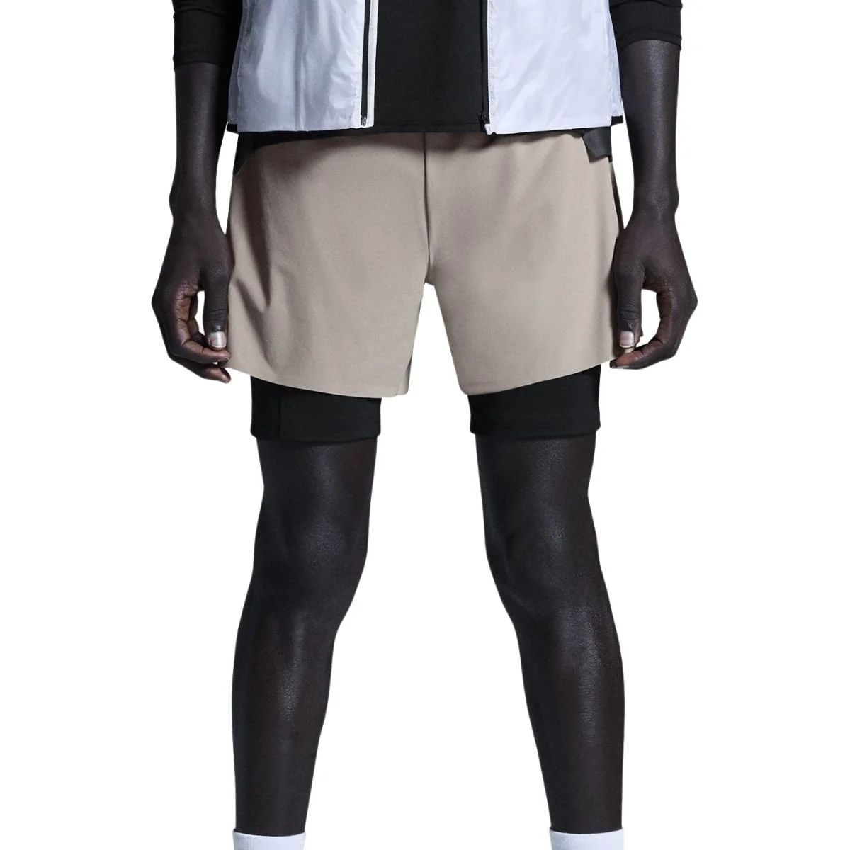 On Performance Shorts in tan