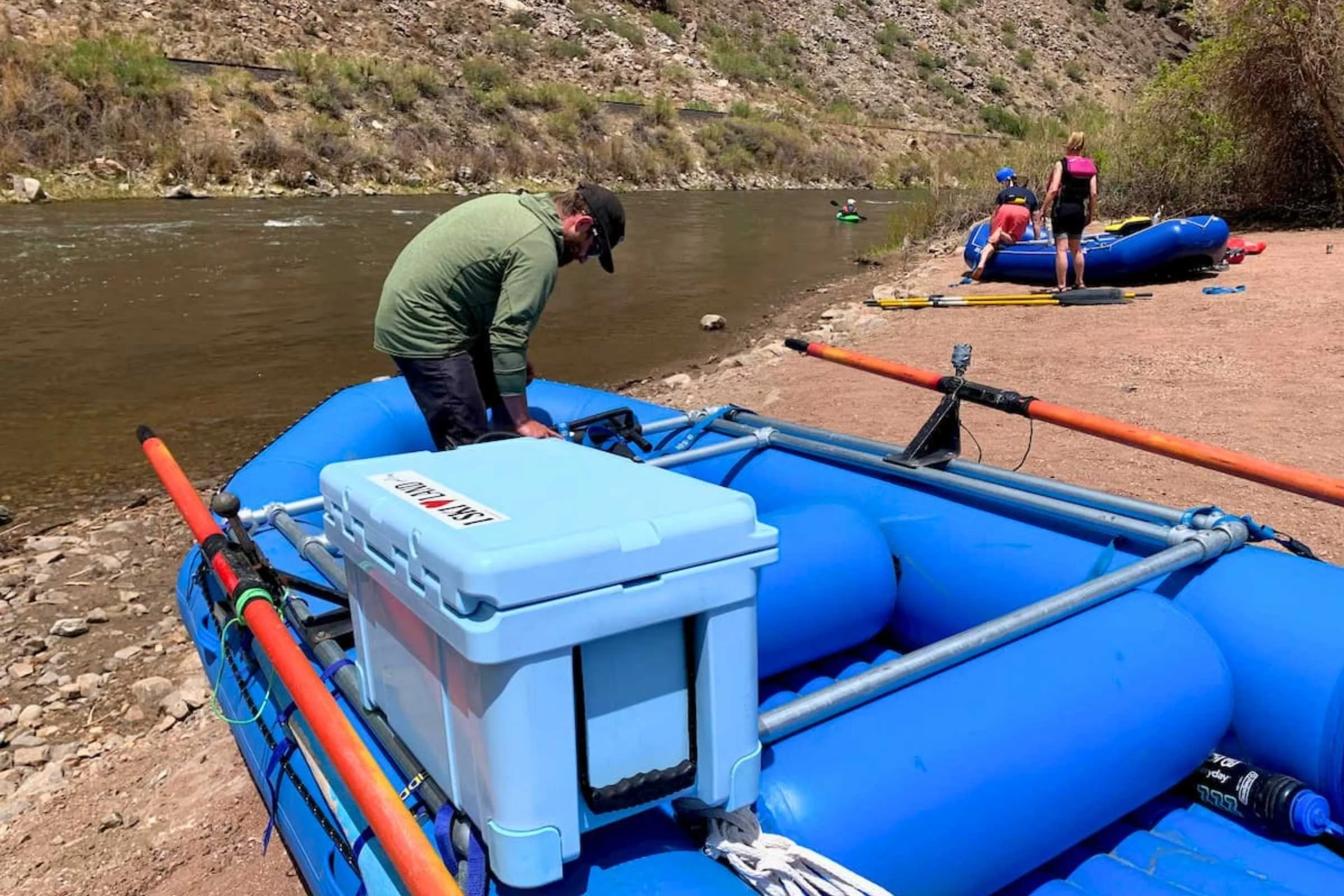 Coolers are an essential part of long rafting trips. Each night of a rafting trip involves camping, camp kitchens, and lots of gourmet food. Our testers used hardsided coolers on long camping trips on multiple rivers. Photo courtesy Josette Deschambe