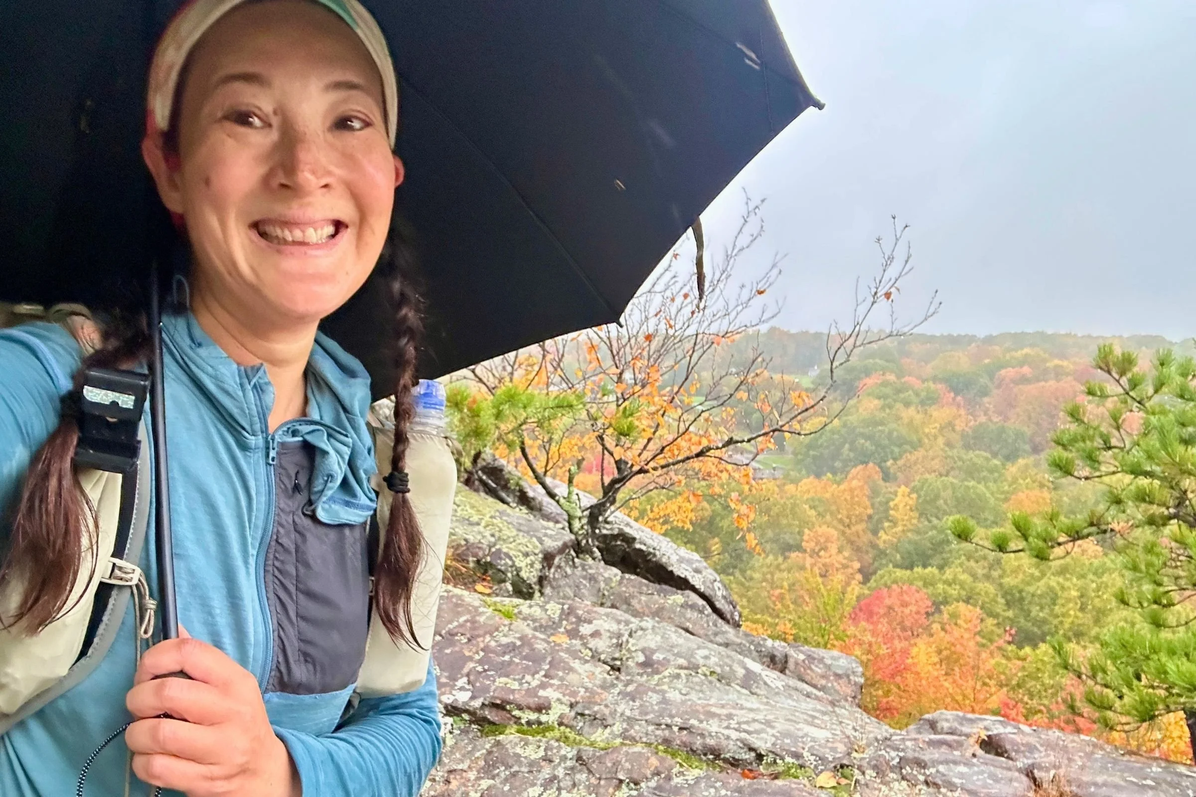 The Gossamer Gear Lighttrek umbrella has a huge dome that protected me from rain and also kept the top of my pack dry.