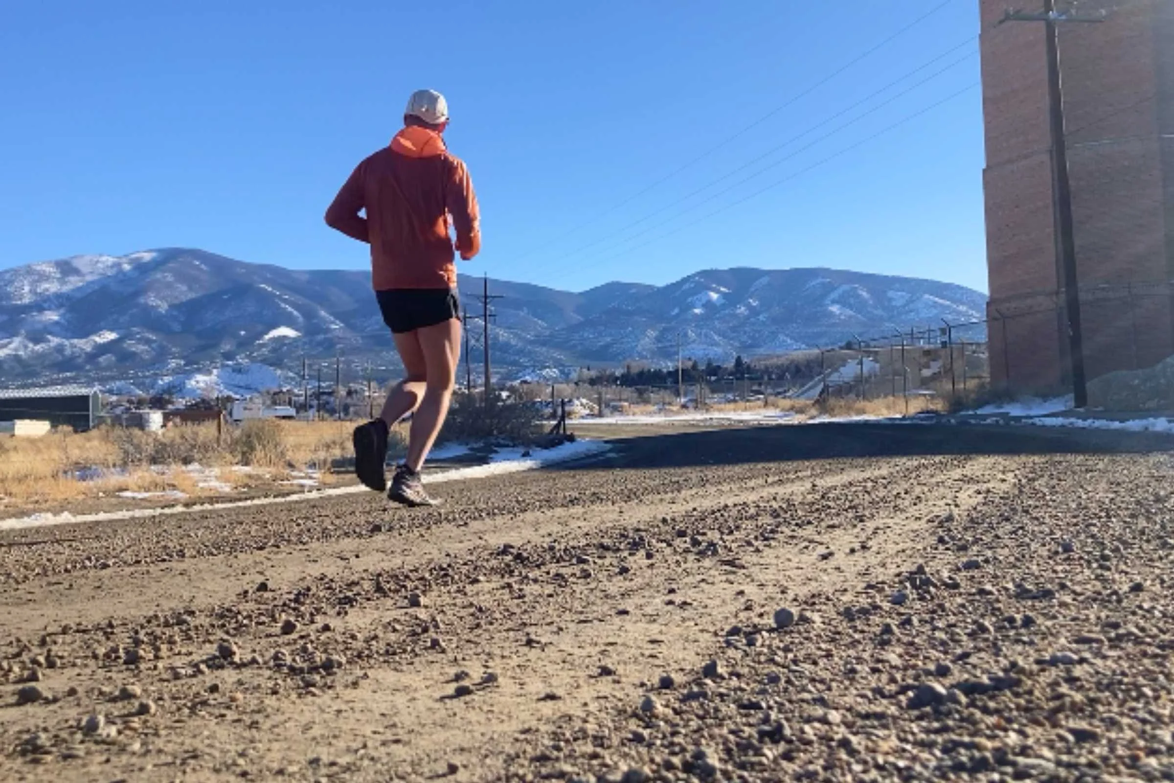 The author running in the Wrightsock Coolmesh II on a gravel road in Salida, Colorado.