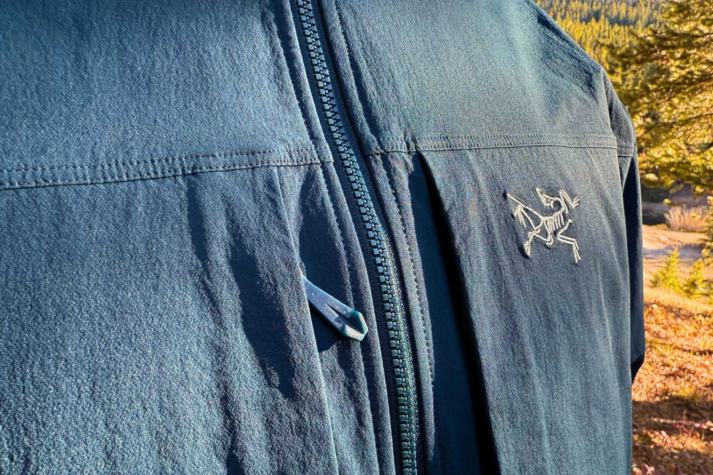 The Arc’teryx Gamma is made of a stretchy softshell material that prioritizes breathability while still offering weather resistance, including a DWR coating on the face fabric.