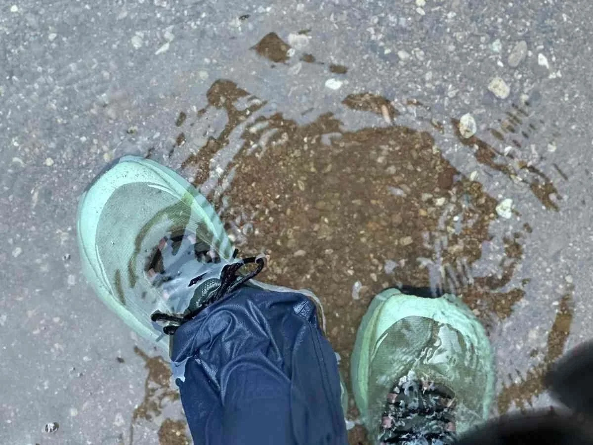 The Topo Pursuit 2 trail running shoes completely submerged during a creek crossing on the Mogollon Rim Trail thru hike