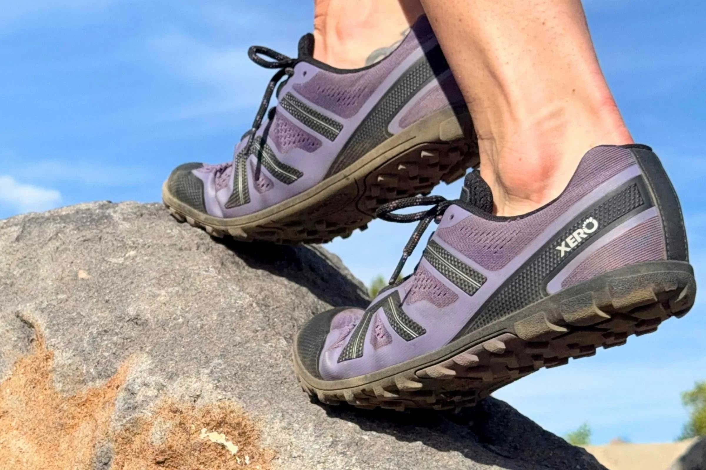 Xero Messa Trail II barefoot shoes scrambling up a rock