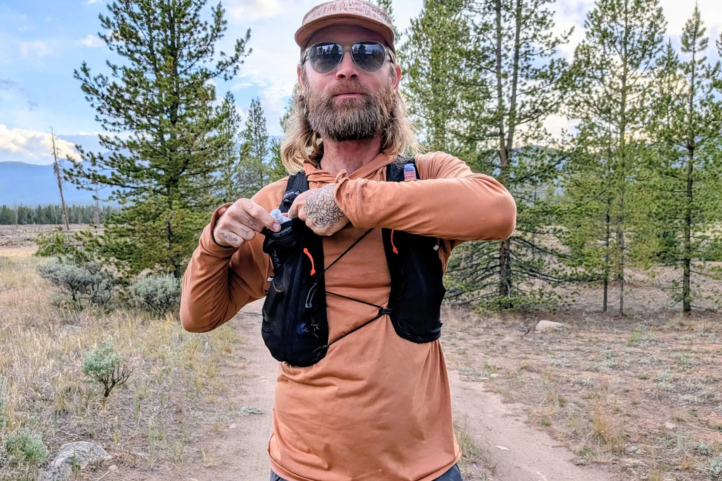 Hyperlite Mountain Gear Pemi 15 Running Vest front view showing pocket layout and strap configuration