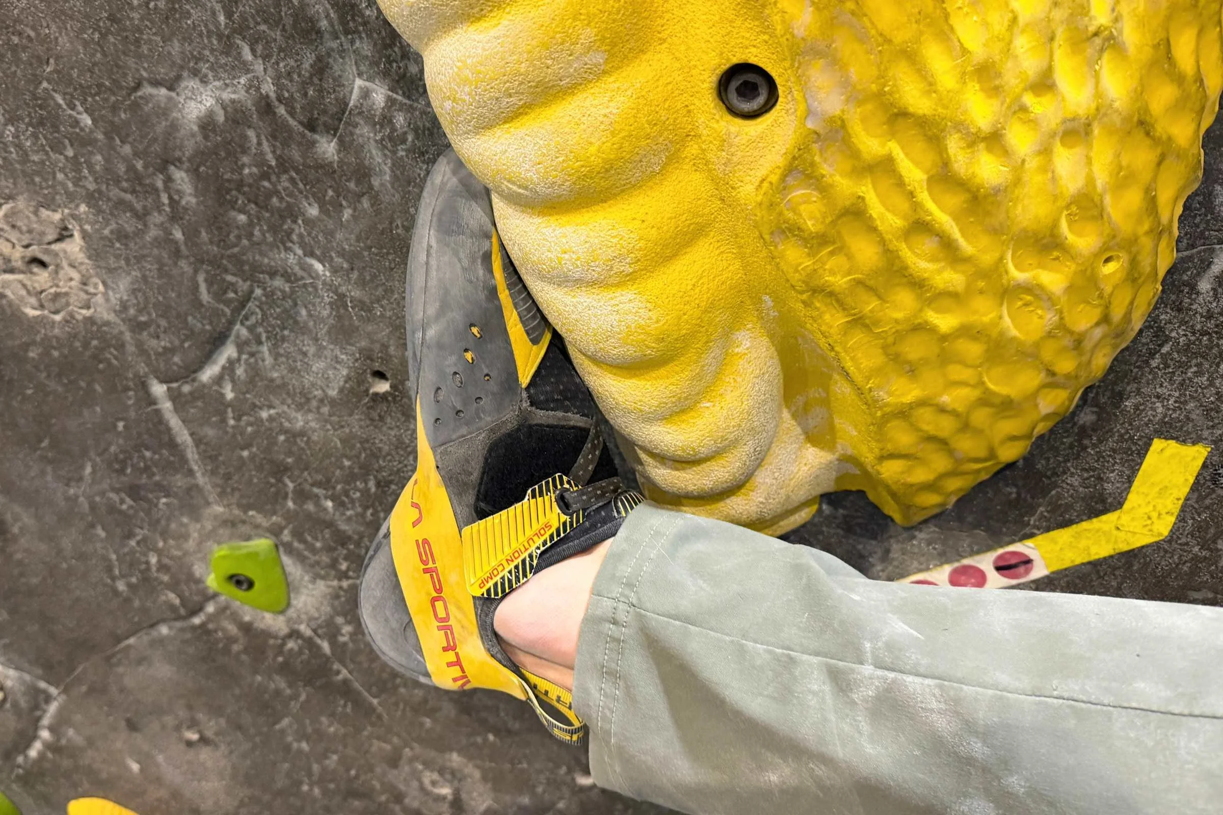 Climber toe hooking in La Sportiva Solution Comp