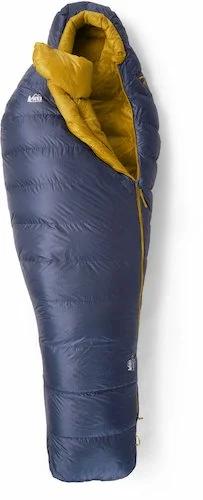 The REI Magma 30 sleeping bag in navy blue with a mustard yellow lining.