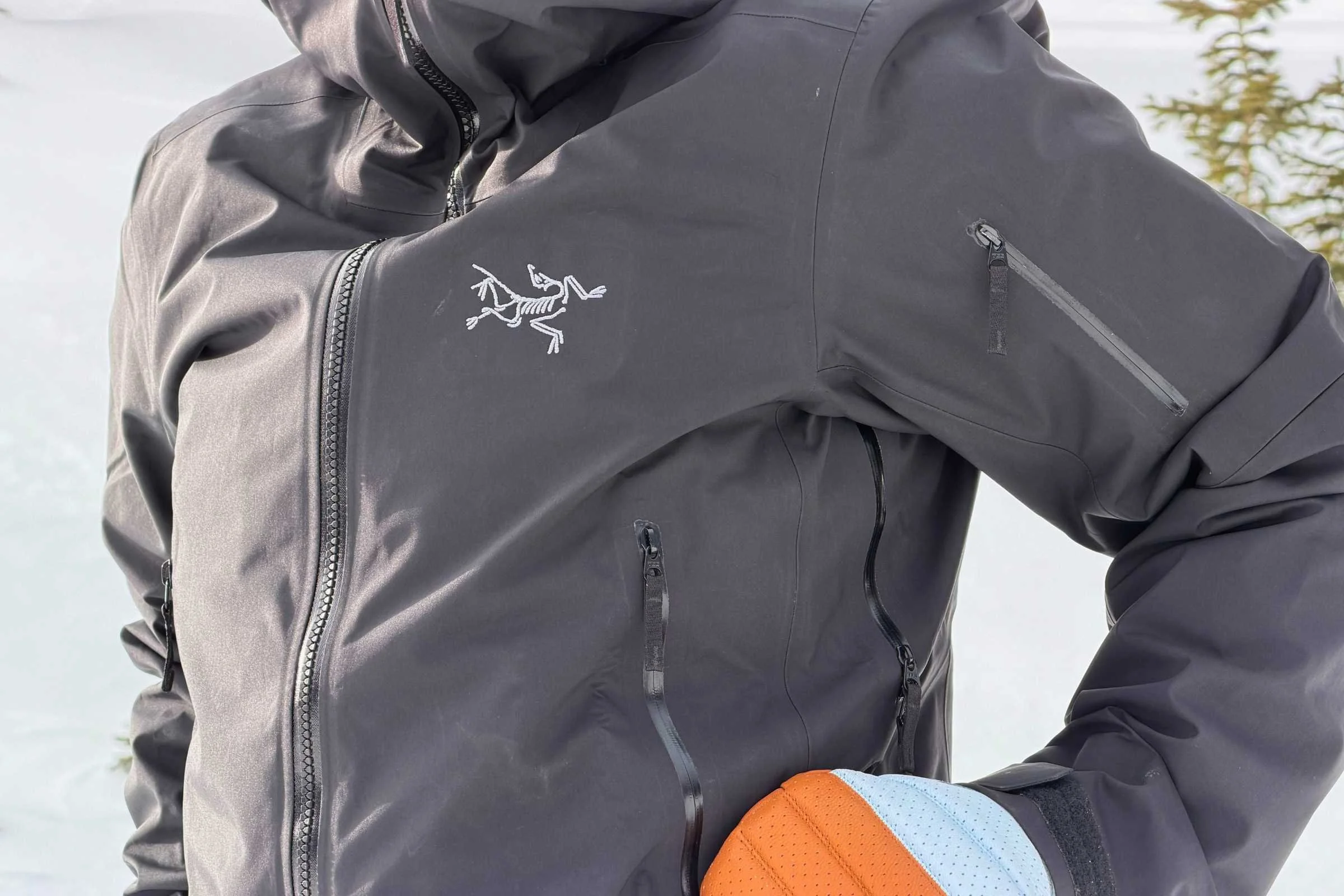 Close-up on the pockets, waterproof zippers, and pit zips on the newest version of the Sentinel jacket.
