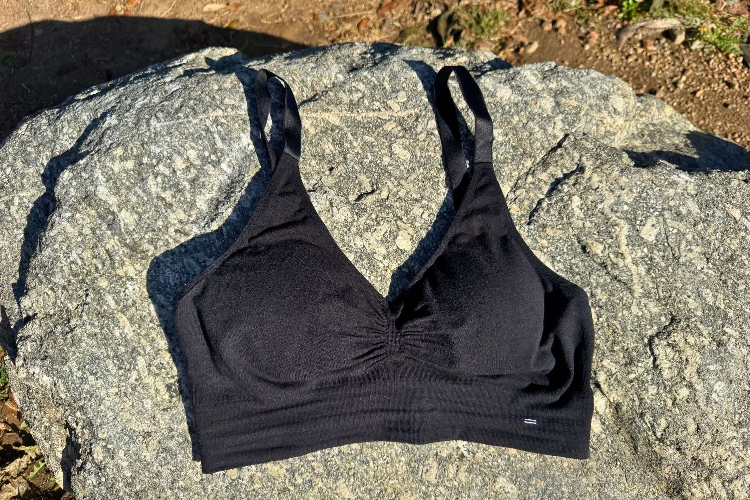 A closeup of the black Branwyn Essential Supreme bra with the optional pads inserted.