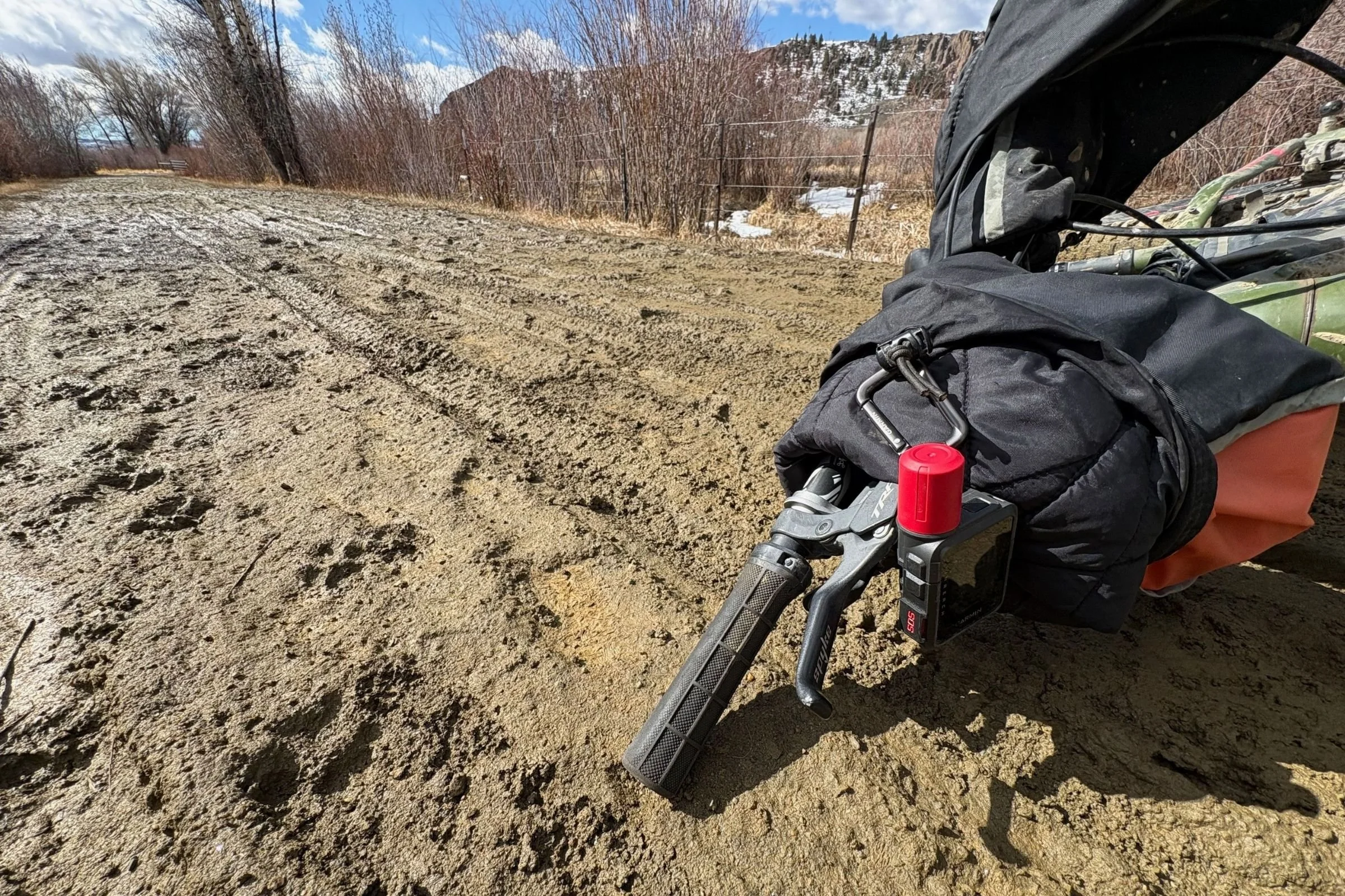 Testing the Garmin inReach Mini 3 Plus' weather proofing by attaching it to the front of a fat bike