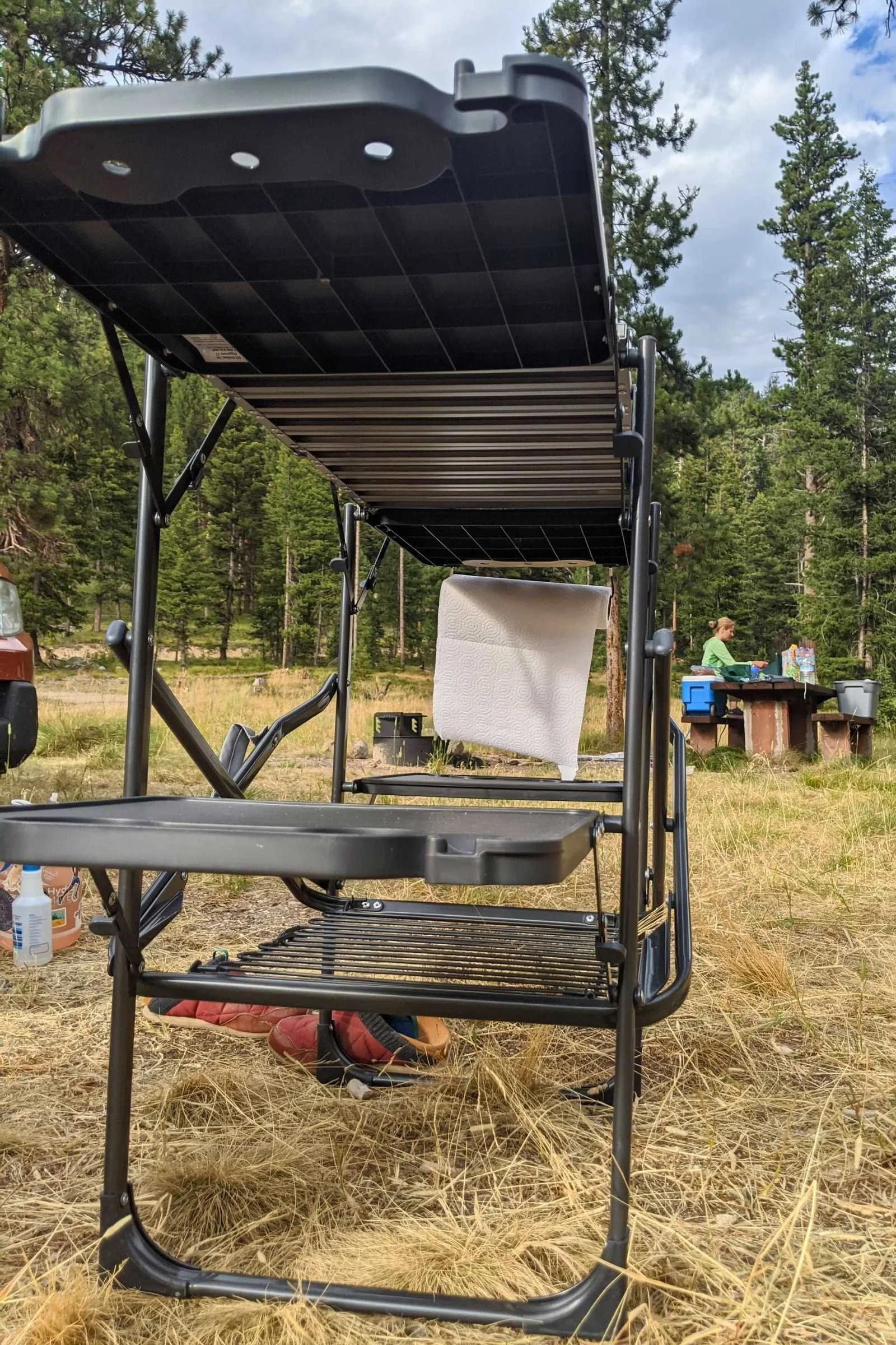 The GCI Outdoor Slum Fold Camping Station during a 5-day fly fishing campout in the Bitterroot Valley in Montana. The 4 side tables make it easy to prep for cooking or store a beverage and storage basket underneath is ideal for ingredients.