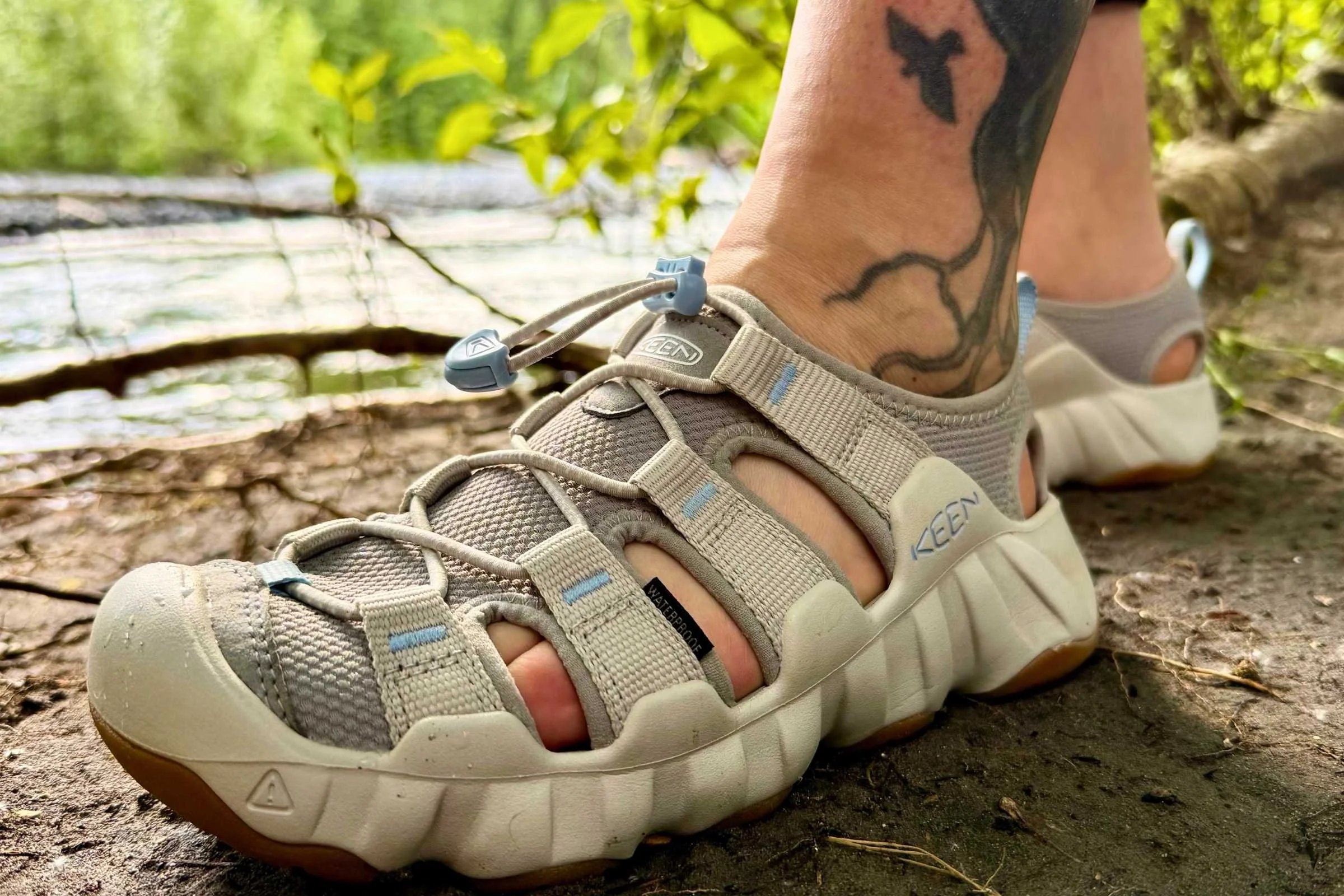 Keen Hyperport H2 water shoe side profile on a bank next to a river