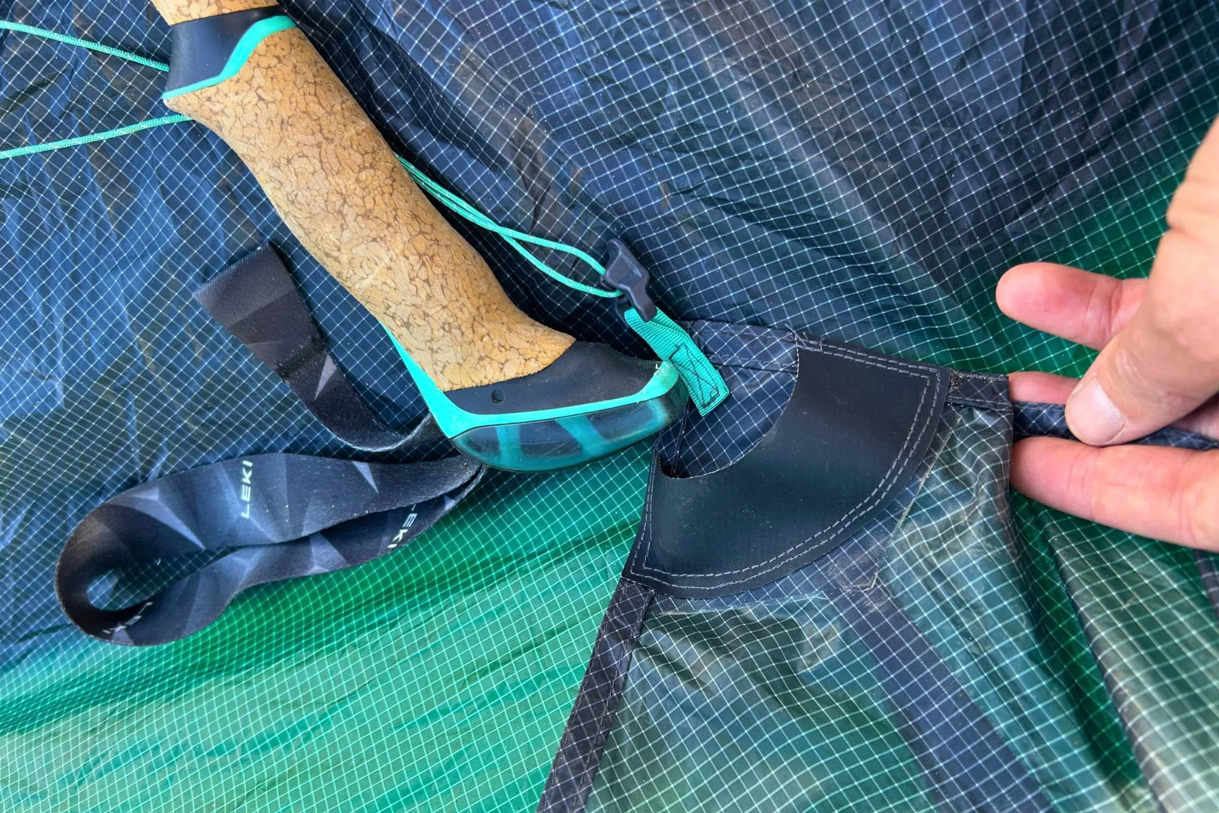 The trekking pole holding pocket doesn't quite fit several of the trekking poles we tested it with, either the handle or the tip.