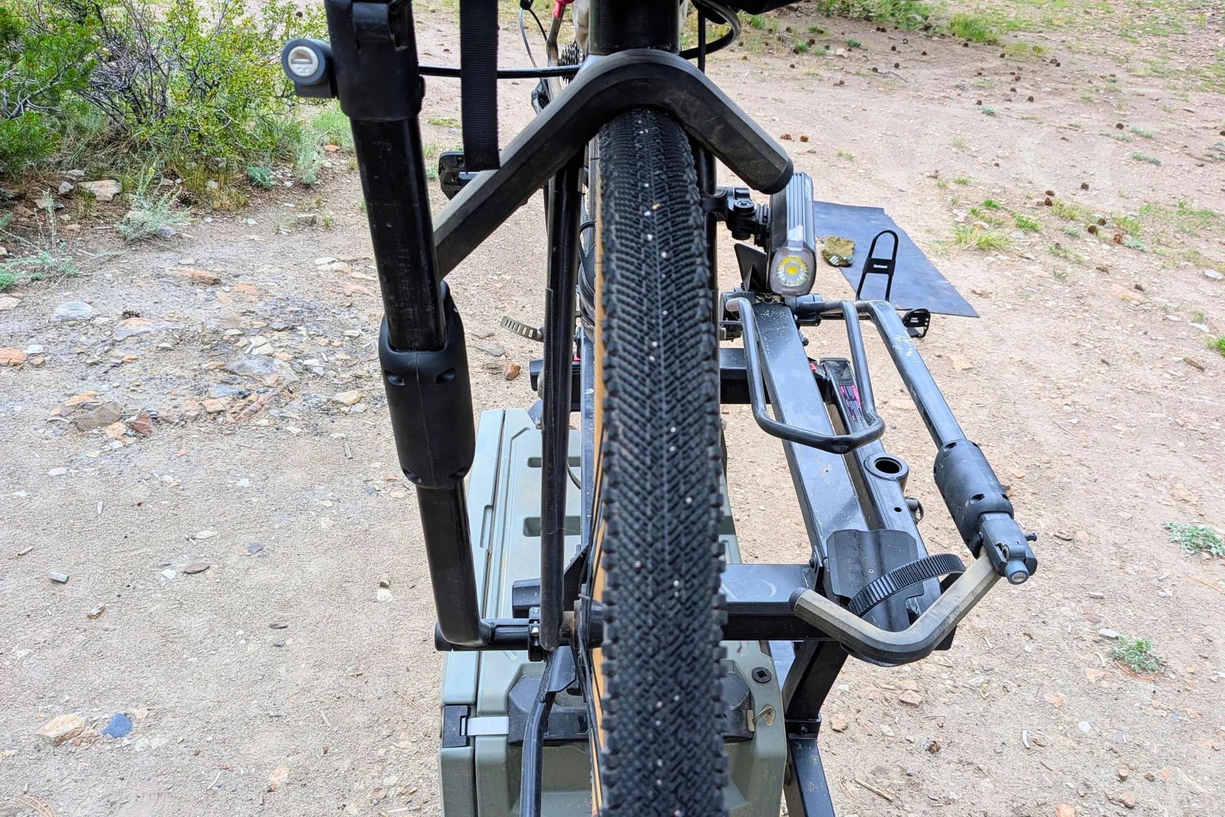 A bicycle with a Yakima EXO DoubleUp 2-Bike Hitch Rack attached.