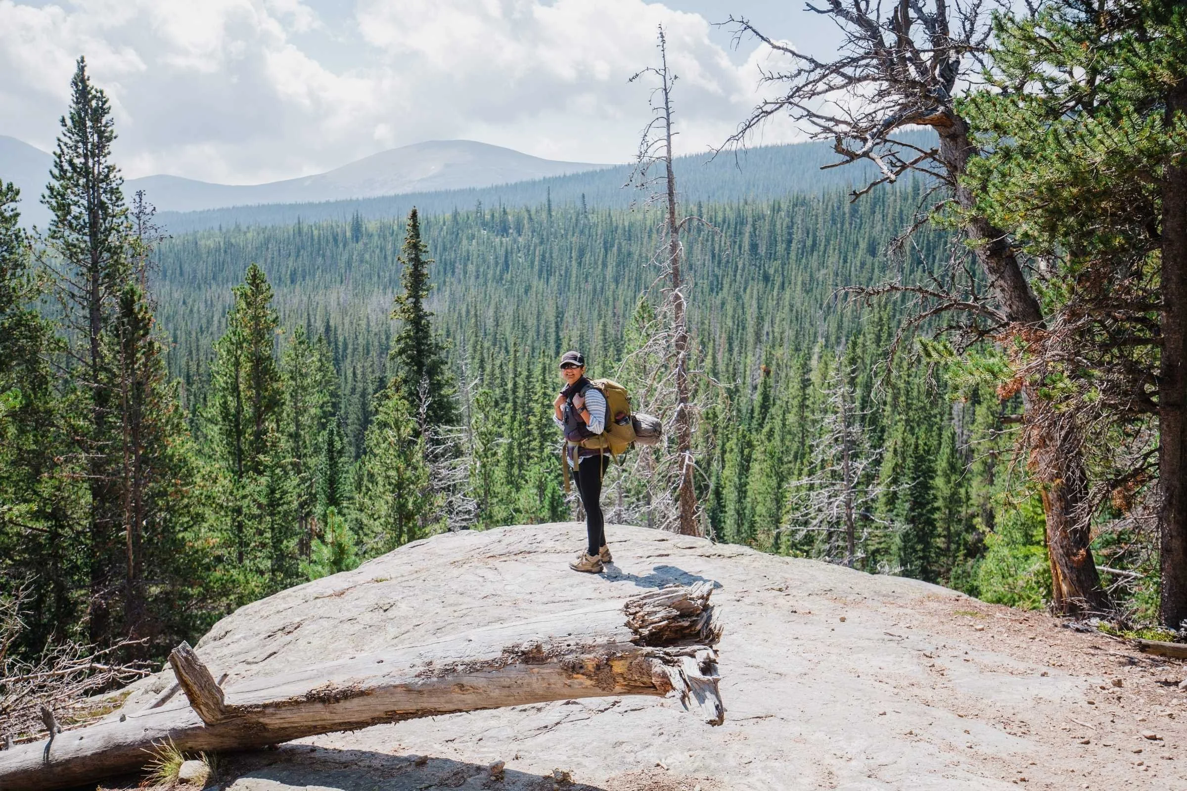 the author hiking in the woods