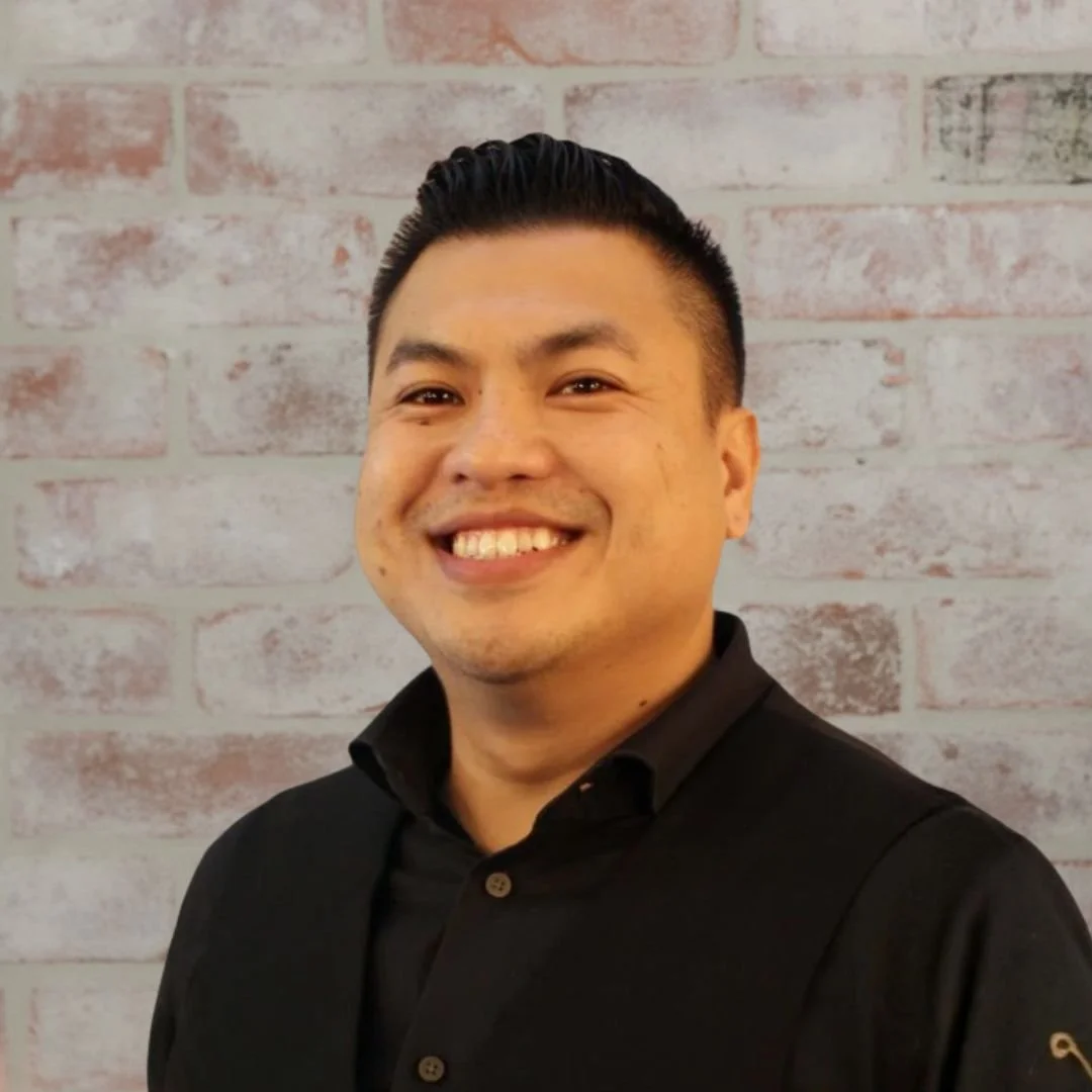 West Coast Bay San Francisco bay area bartender Angkham Khetsavanh asian bartender experienced black suit