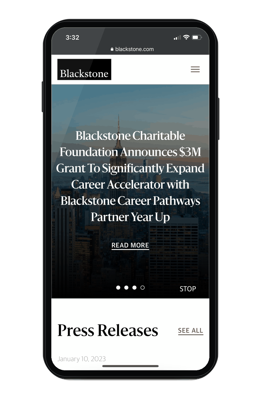Mobile phone screen displaying a news website with a headline about a $3 million grant from the Blackstone Charitable Foundation, and a section titled 'Press Releases' with a date of January 10, 2023.