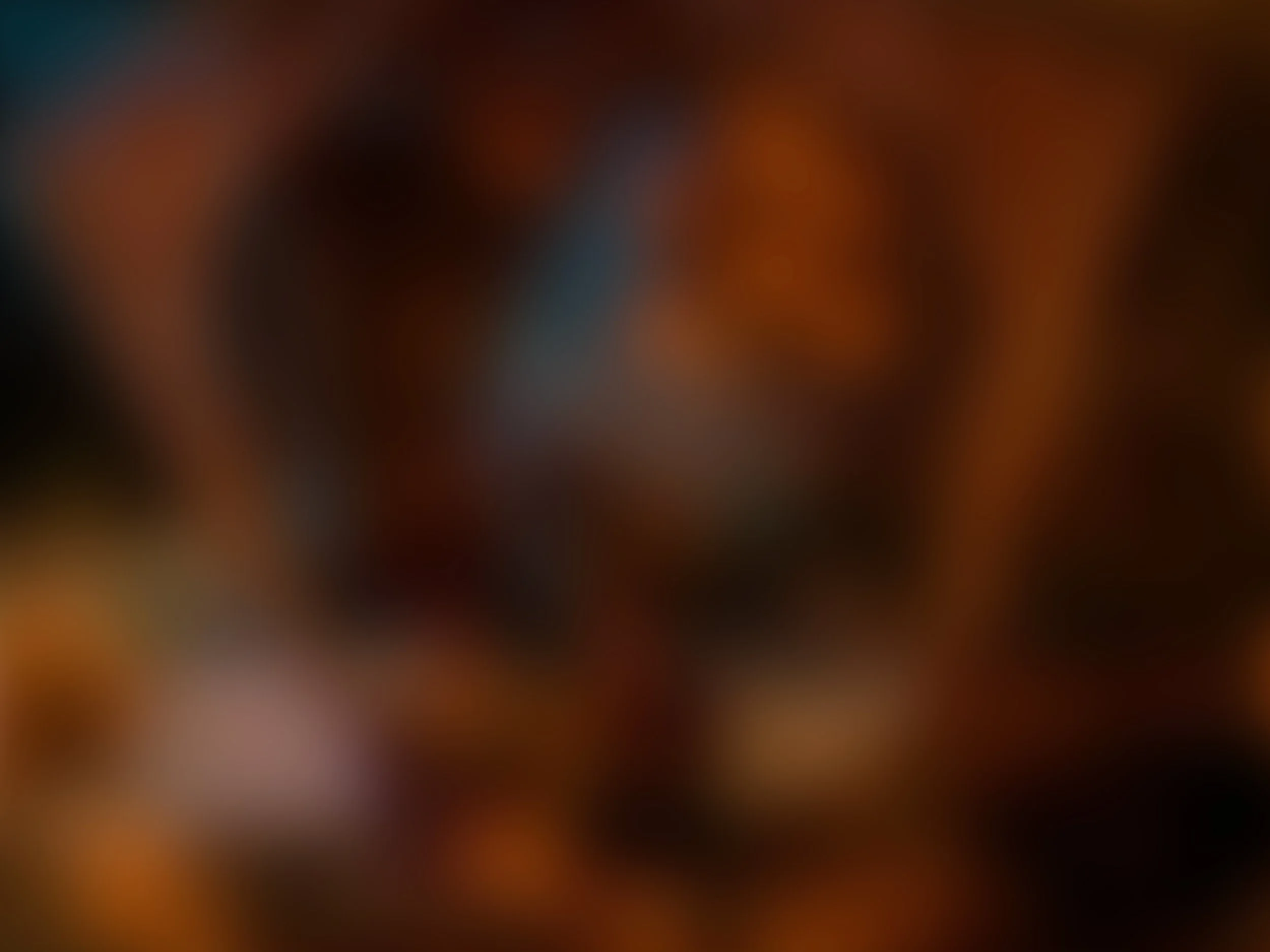 Blurred image showing indistinct colors and shapes