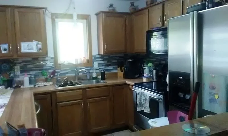 Unique code: OGAThis entrant says they bought this home about a year-and-a-half ago, and gets straight and to the point about how she feels about the kitchen: "I hate my cabinets and countertops!"