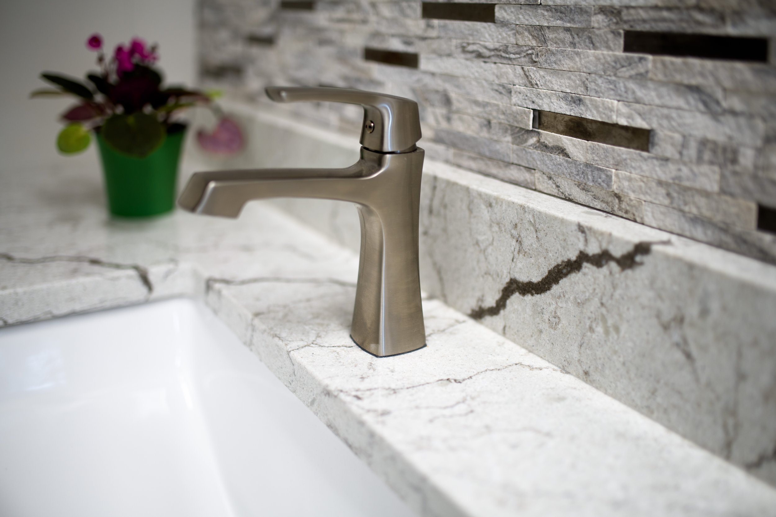 milwaukee studio bath vanity countertop and faucet closeup.jpg