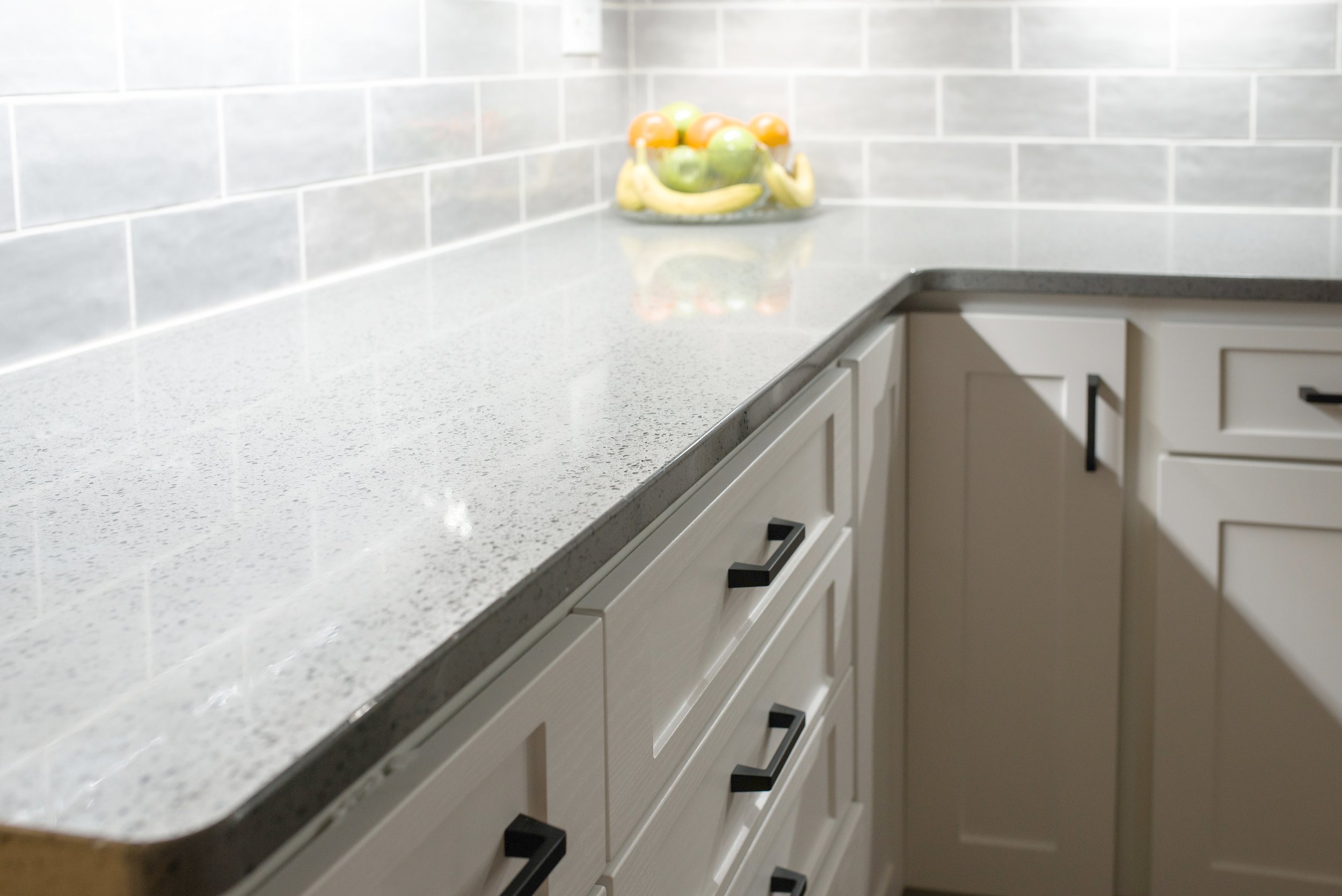 milwaukee studio countertop backsplash under cabinet lighting.jpg