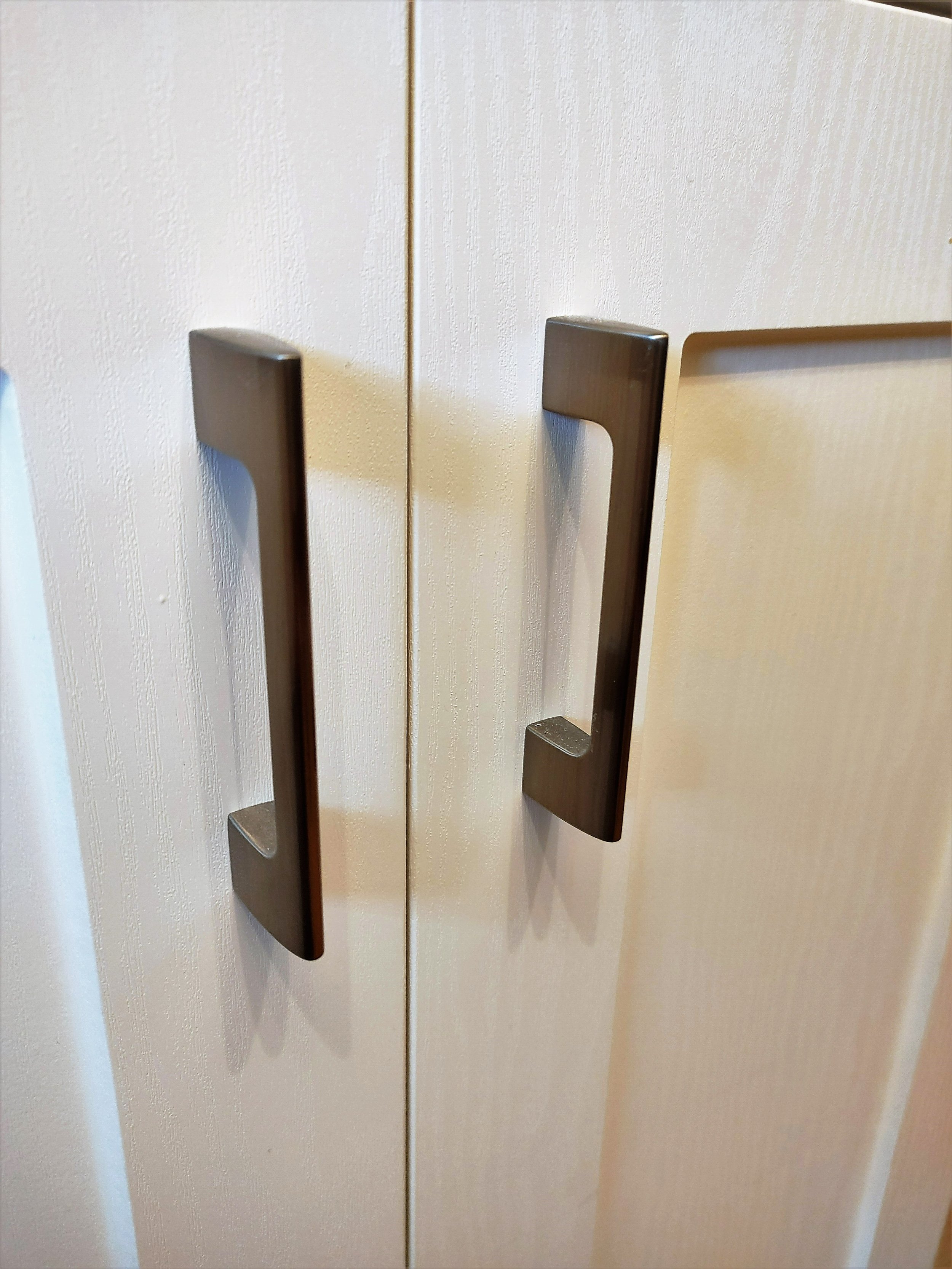 White Kitchen Cabinet Refresh with Stunning Hardware